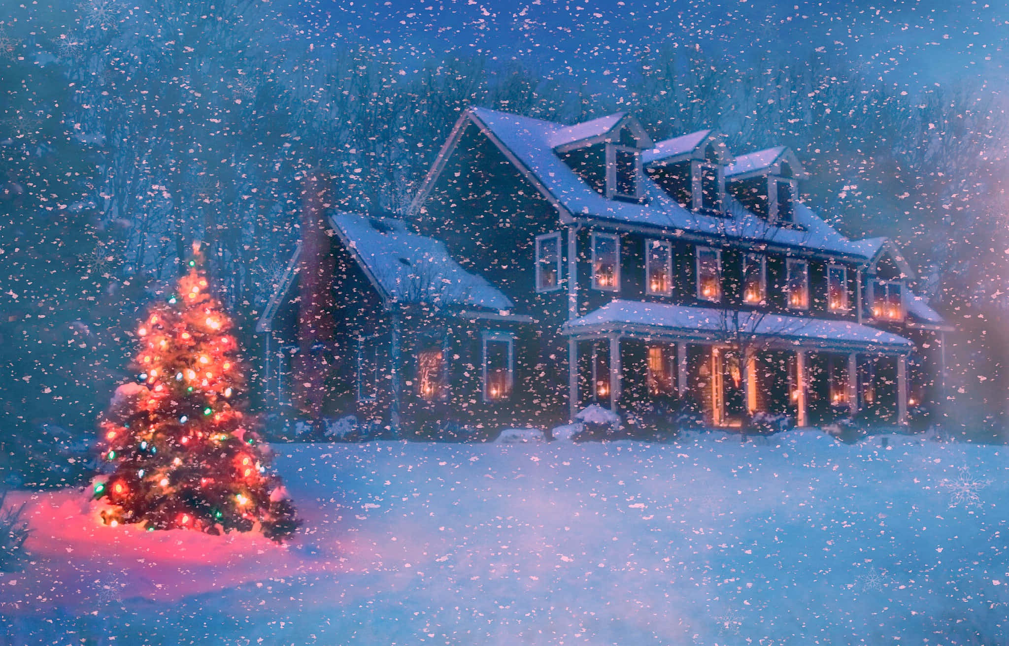 Acogedora casa navideña cubierta de nieve Fondos de pantalla