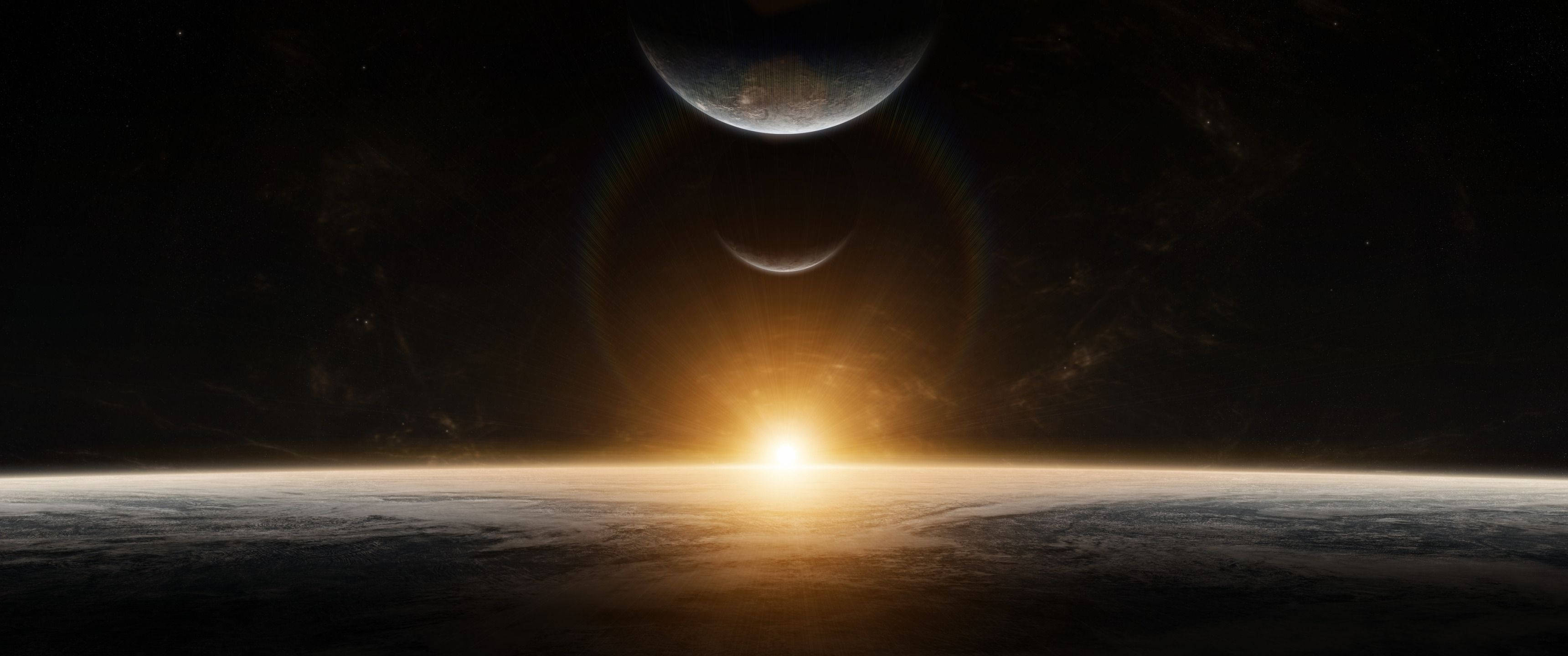 Amanecer espacial iluminando planetas Fondos de pantalla
