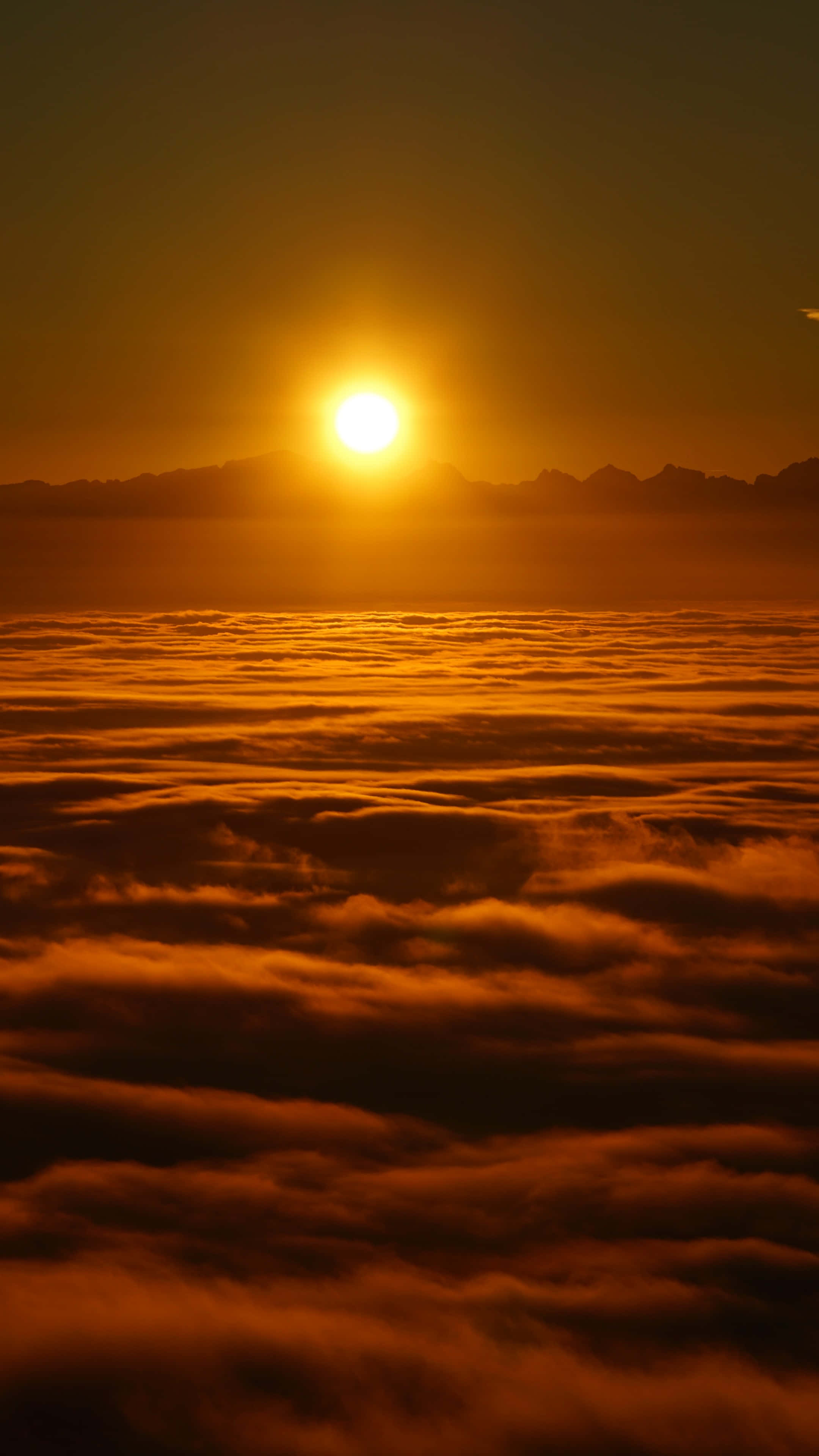 Amanecer sobre el mar de nubes Fondos de pantalla