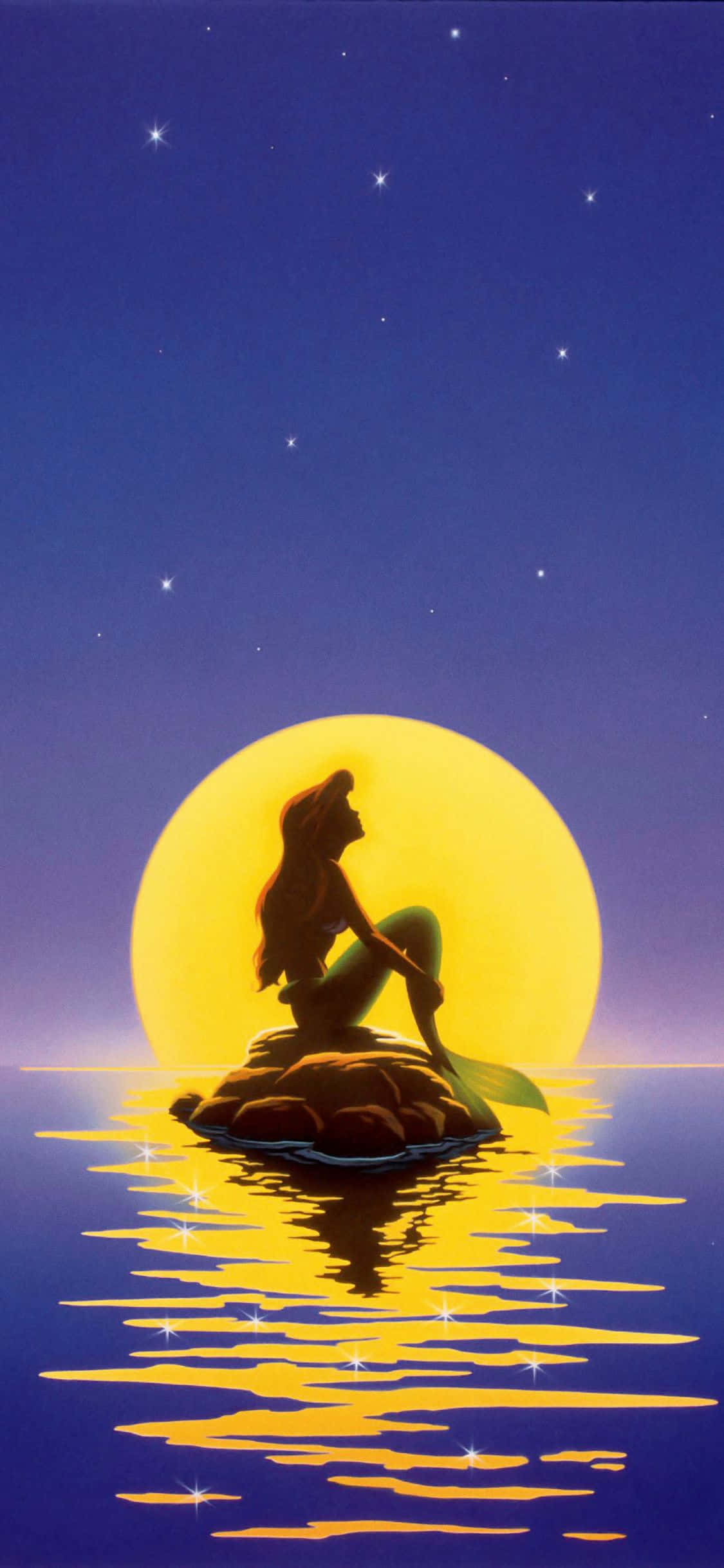 Ariel, la Sirenita, admirando su reflejo en el agua Fondos de pantalla