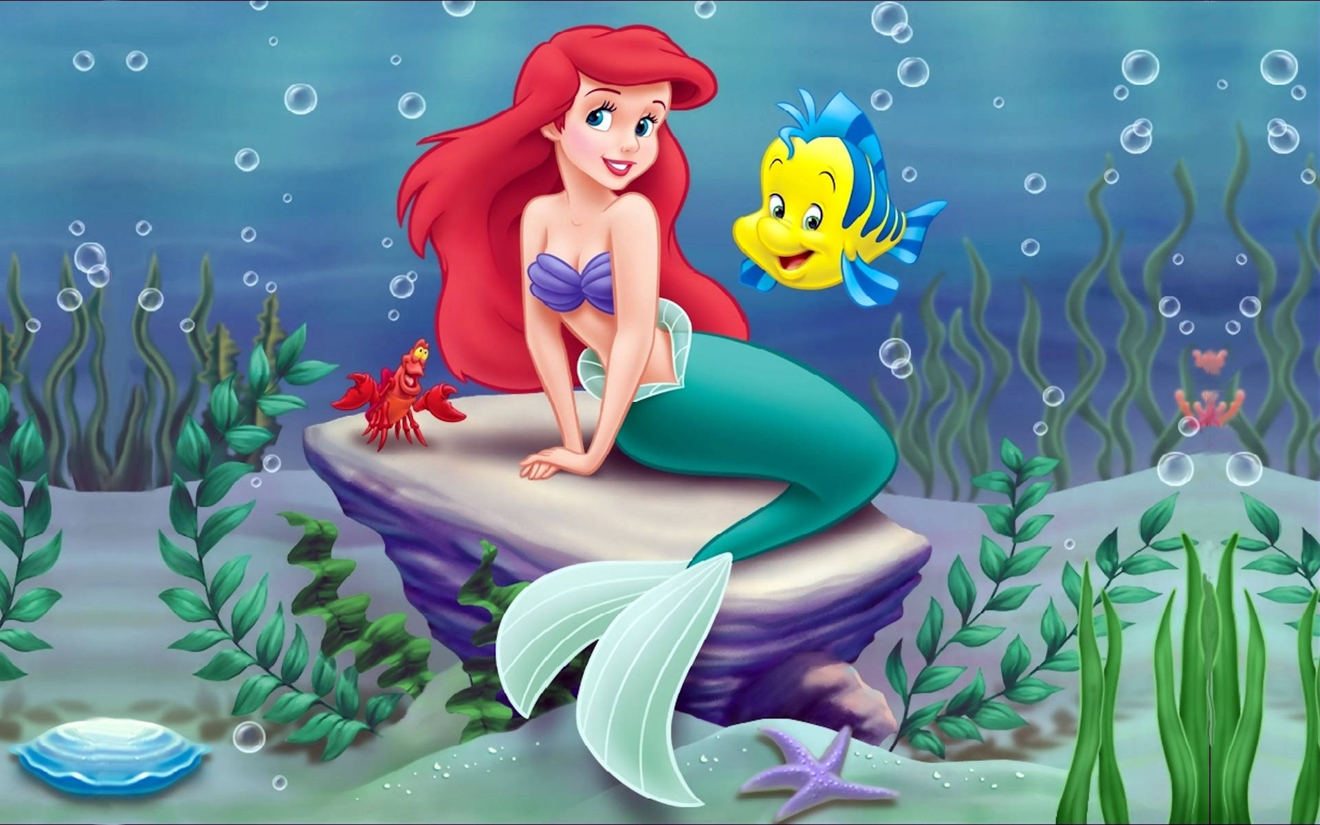 Fondo de pantalla submarino de Ariel y Flounder de La Sirenita.