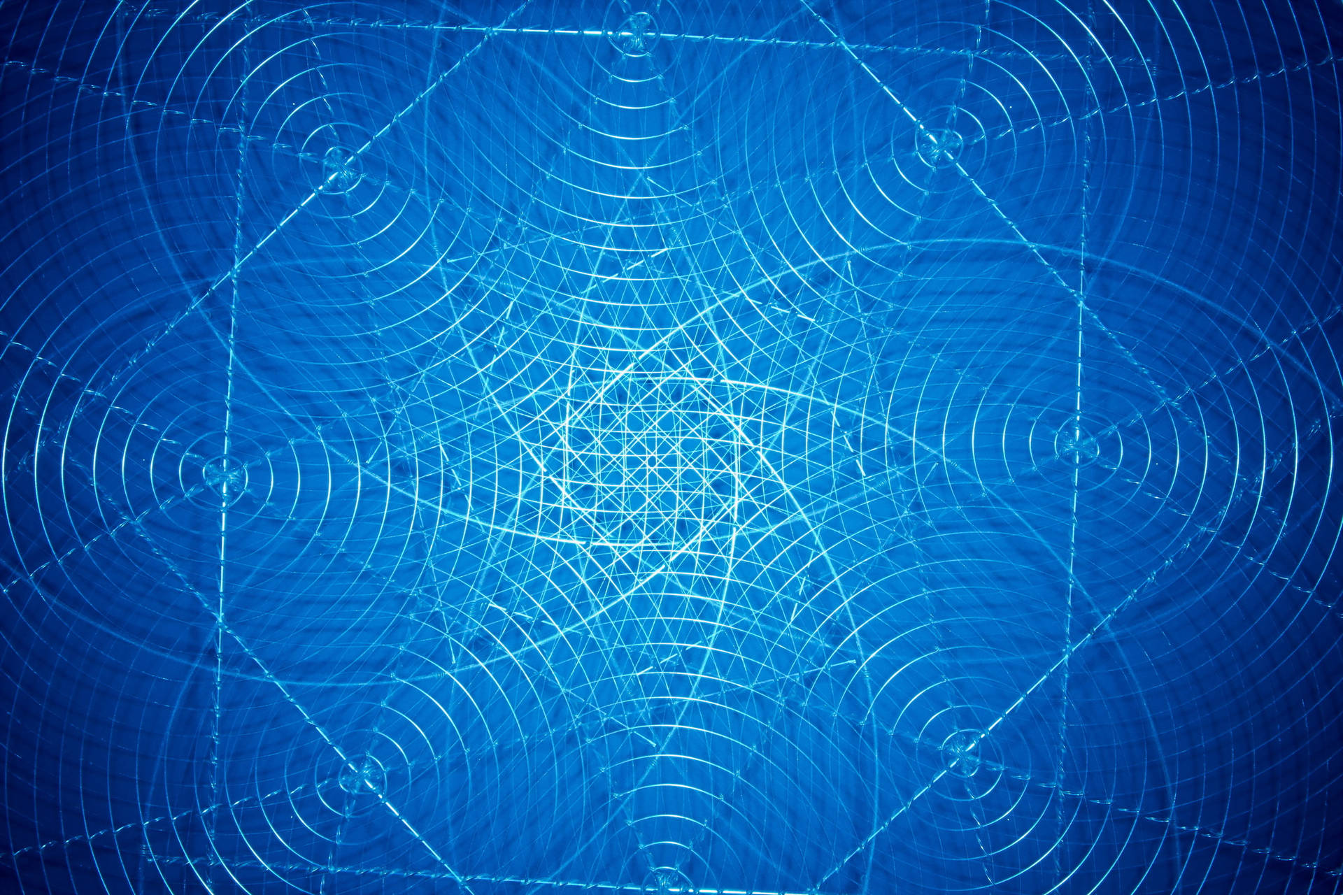 Fondo de pantalla abstracto con patrones geométricos azules