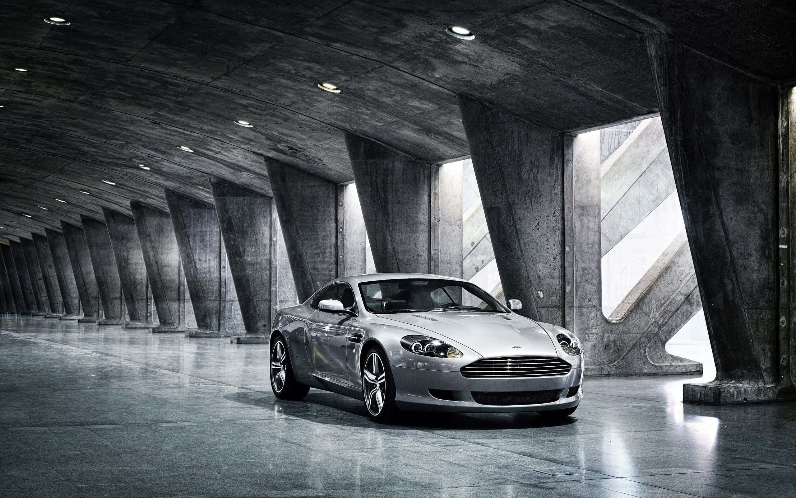 Aston Martin DB9 Navegando por un Paisaje Urbano Escénico Fondos de pantalla