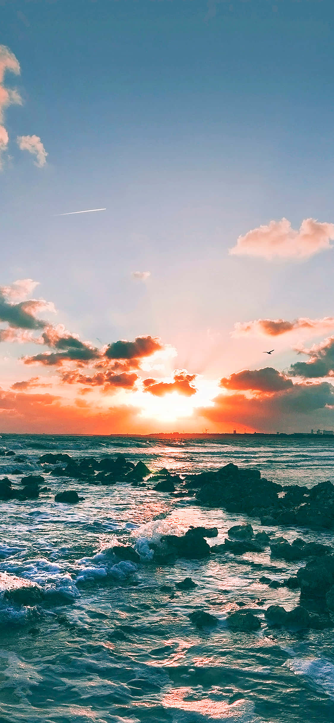 Atardecer Radiante sobre un Océano Tranquilo Fondos de pantalla