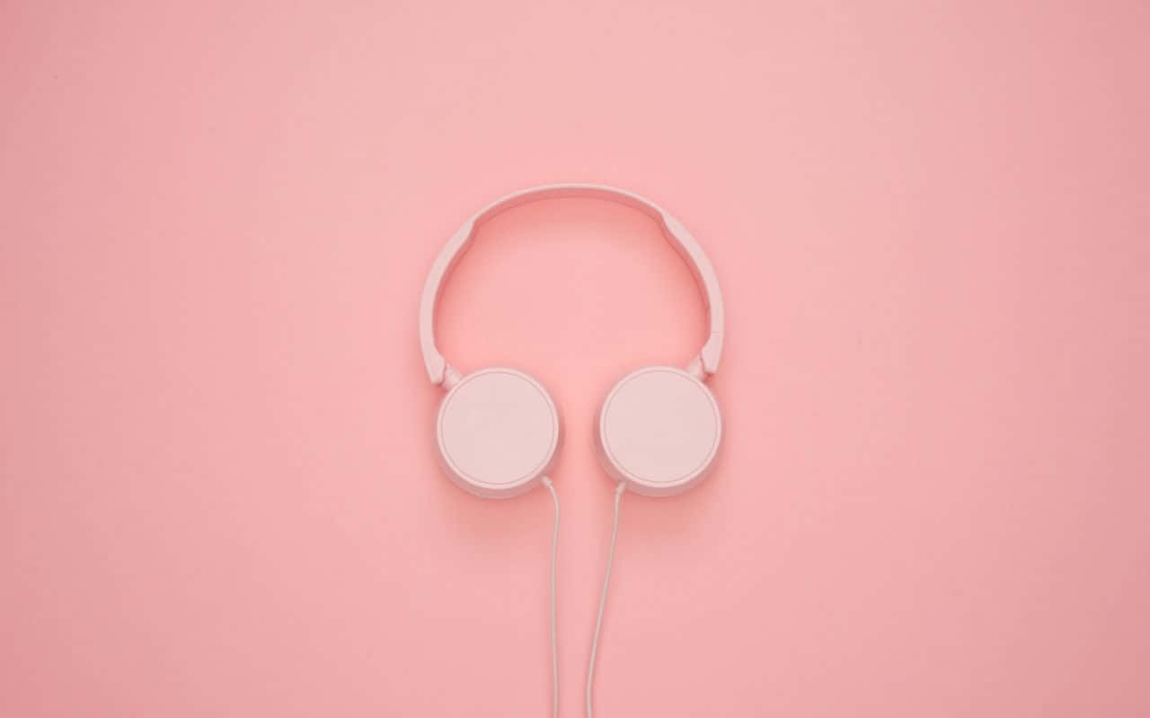 audífonos rosas sobre fondo rosa Fondos de pantalla