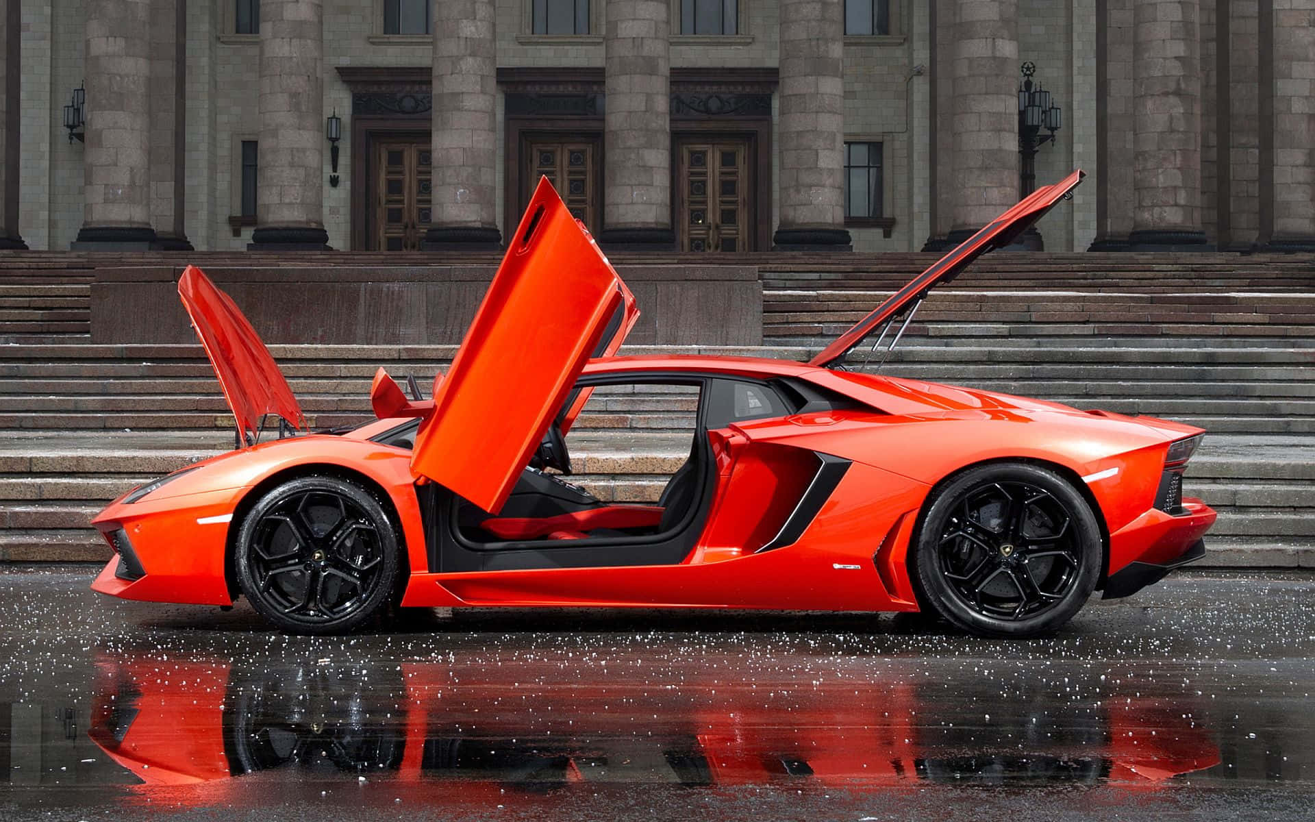 Auto de Lujo Rojo con Puertas Abiertas Fondos de pantalla