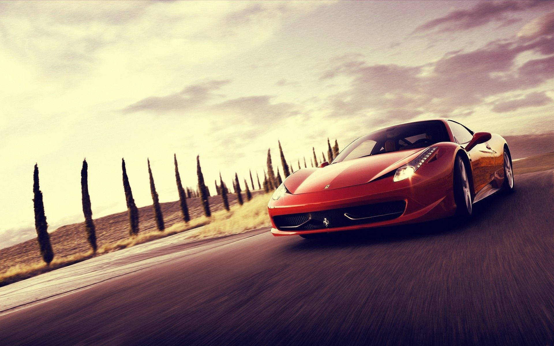 Fondo de pantalla de un Ferrari 458 Italia rojo en movimiento.