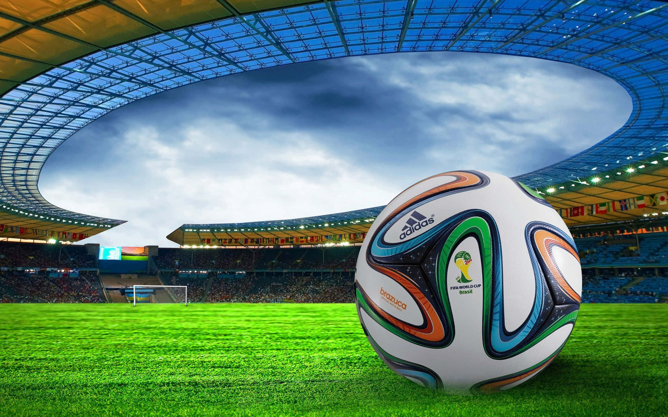 Balón de fútbol galáctico en el suelo Fondos de pantalla