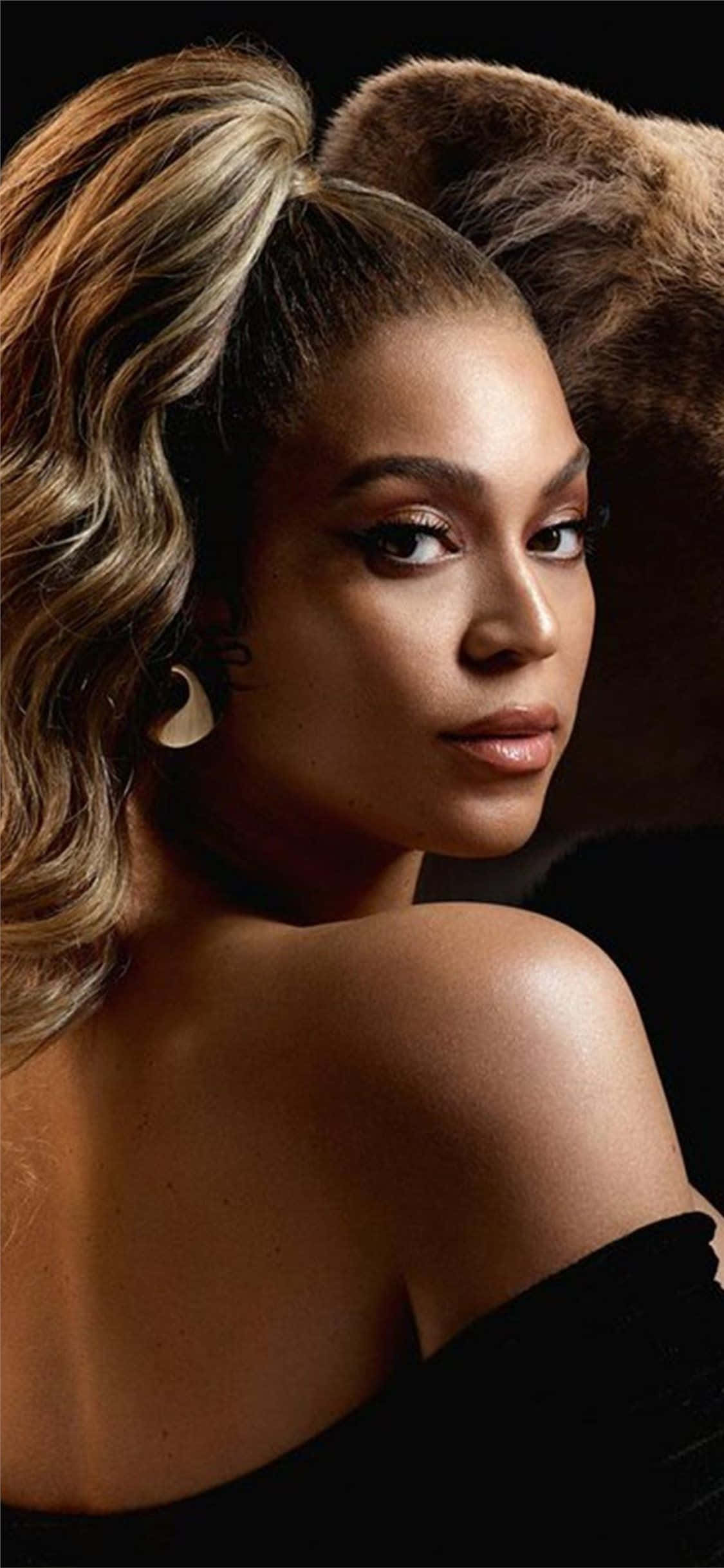 Beyoncé irradia magia, poder y gracia en esta imagen fascinante. Fondos de pantalla