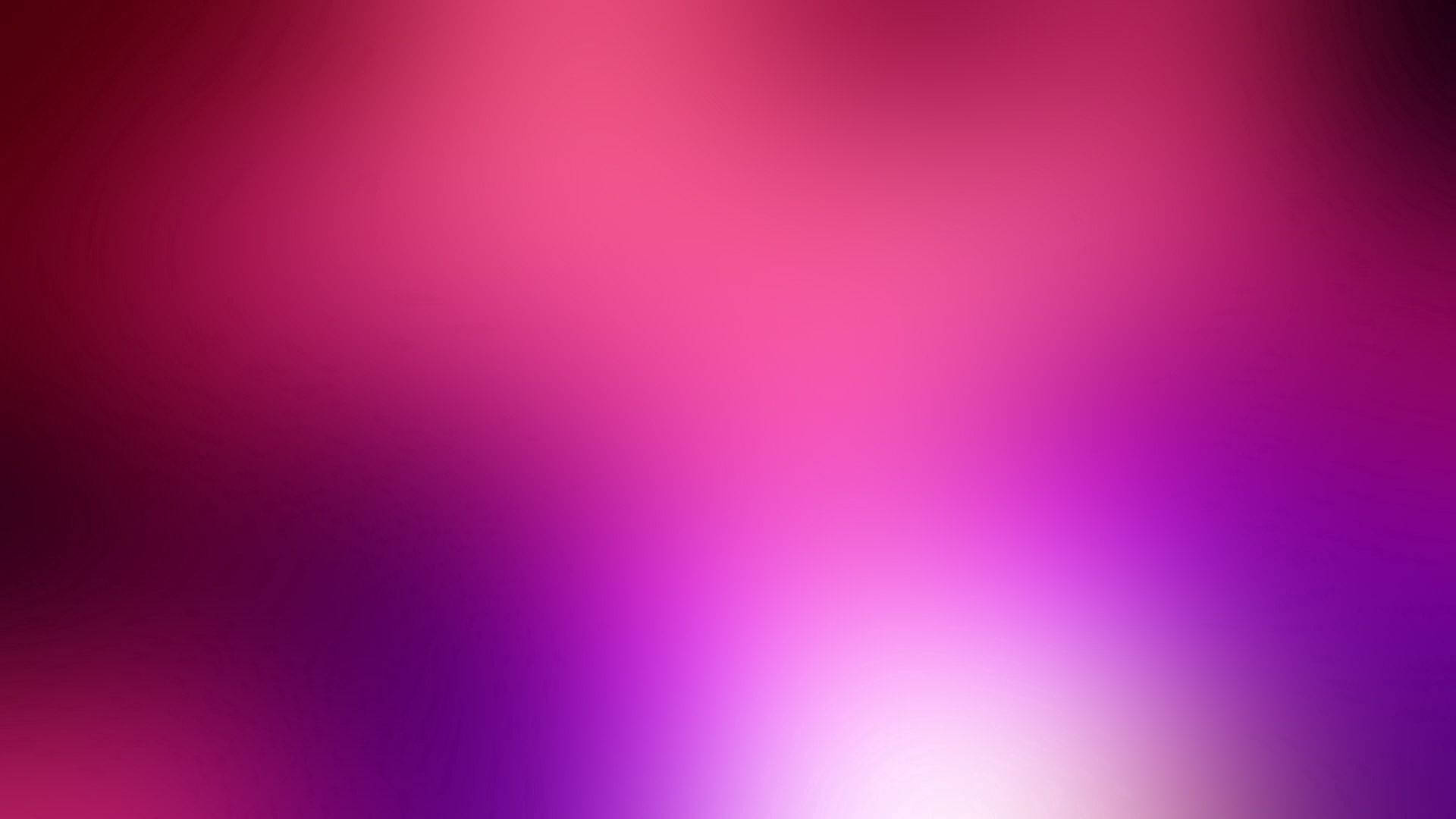 Fondo de pantalla borroso rosa brillante y púrpura.
