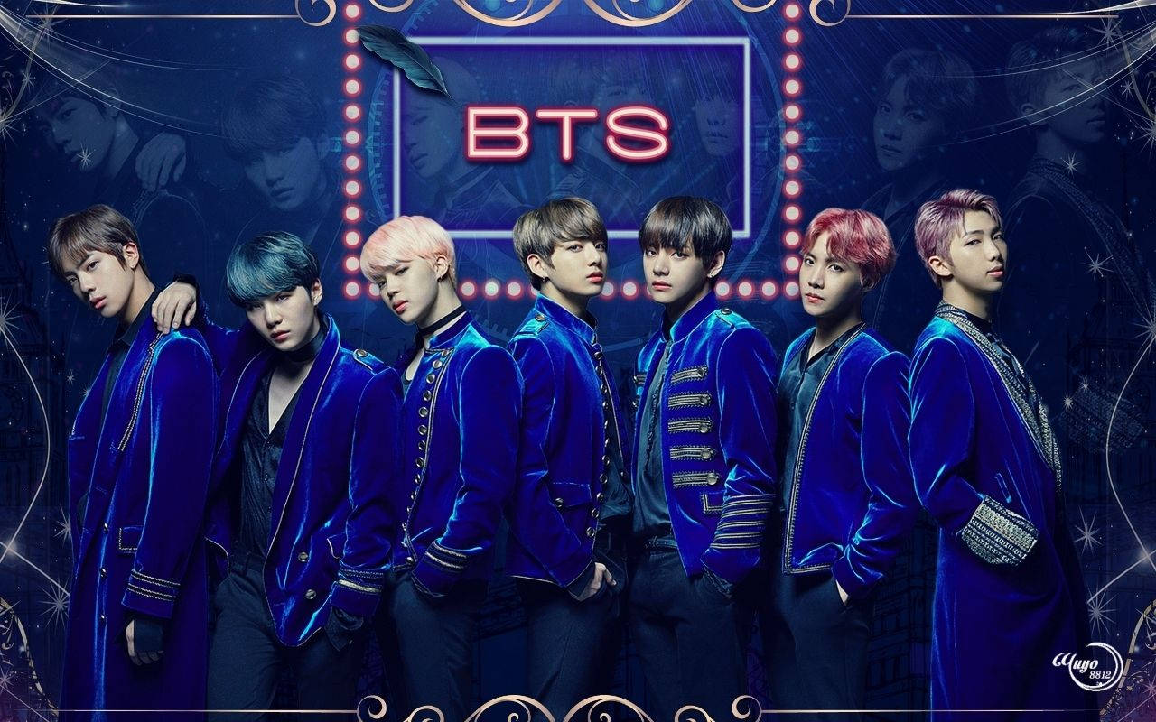 Miembros de la boyband BTS usando chaquetas azules, nueva música.