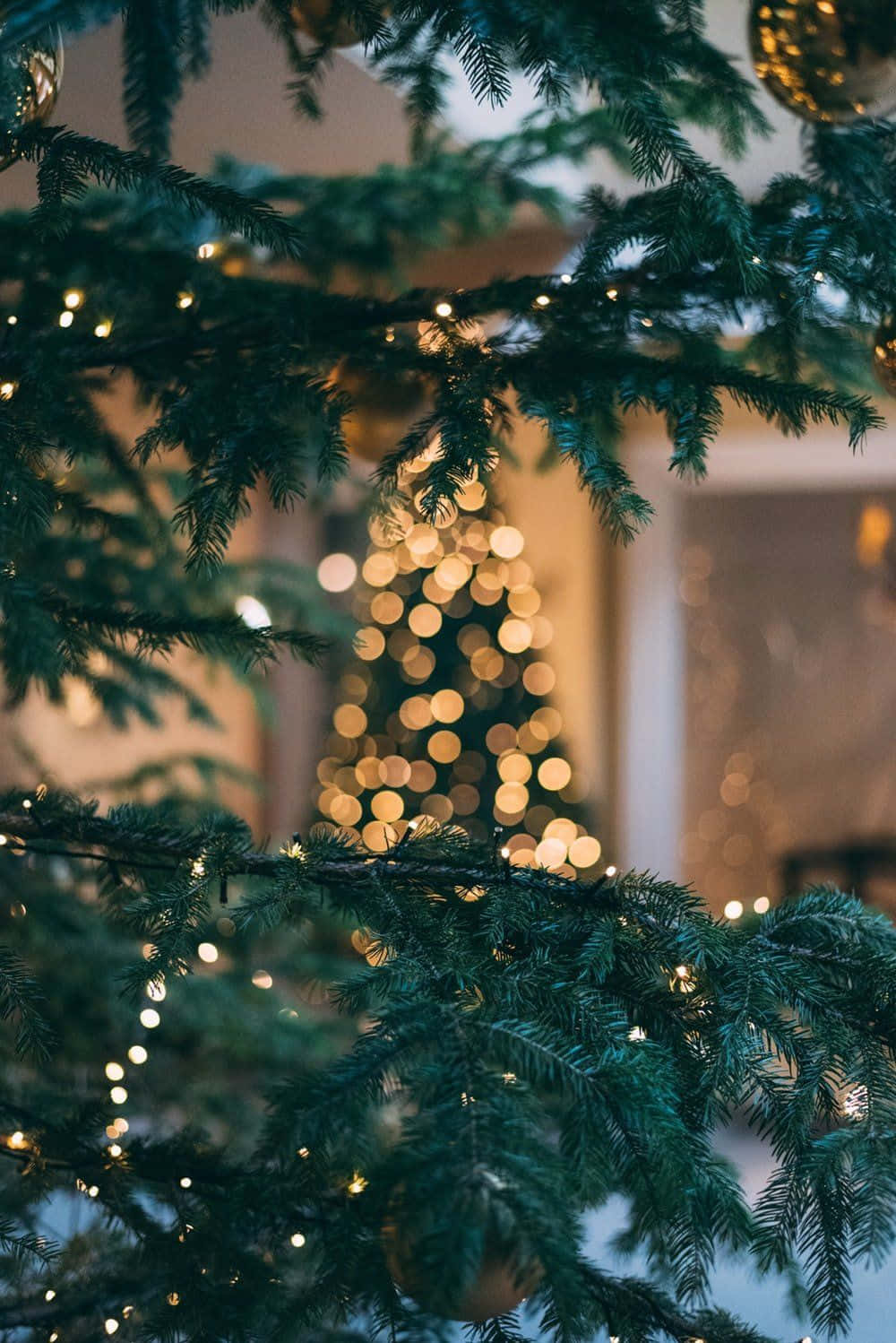 Captura la magia de la Navidad con este fondo de pantalla de ensueño para tu teléfono Fondos de pantalla