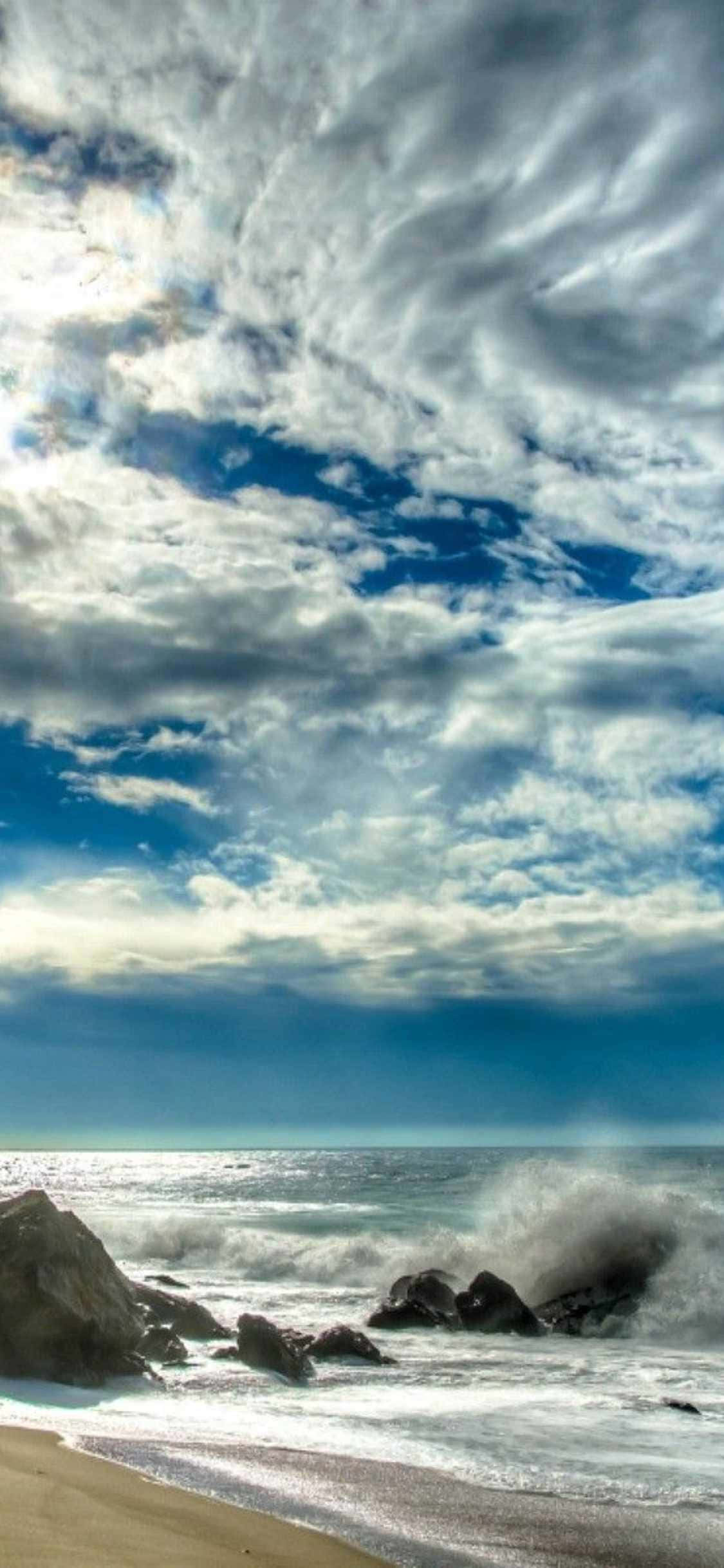 ¡Captura los atardeceres dorados de Malibu en tu iPhone Xs! Fondos de pantalla