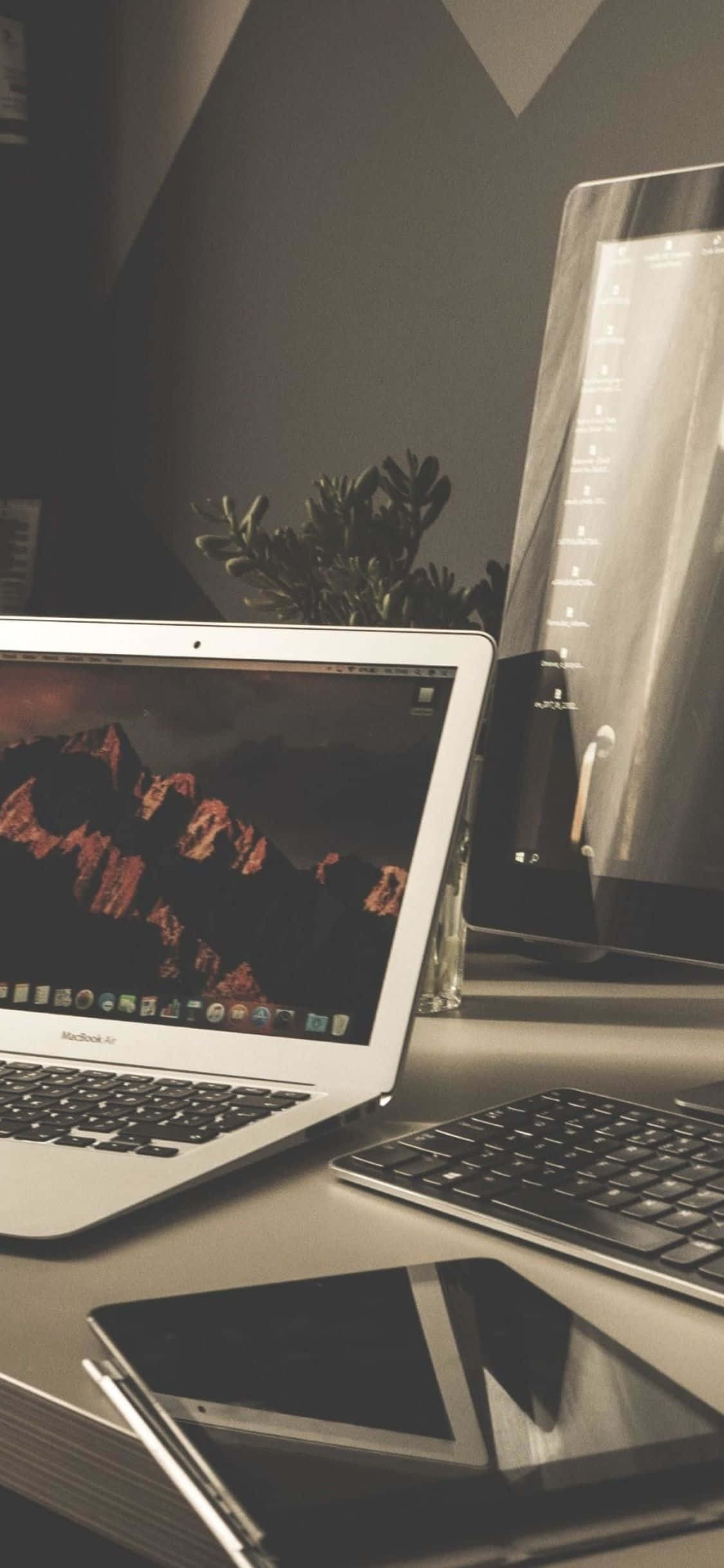 Configuración de escritorio moderna con iPhone XS Fondos de pantalla