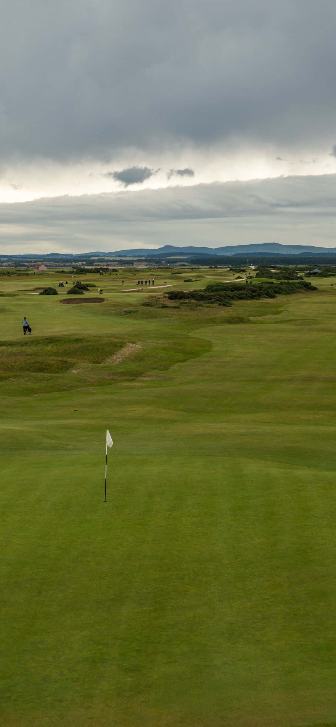 Da un golpe en el campo de golf mientras tu iPhone X captura el momento Fondos de pantalla