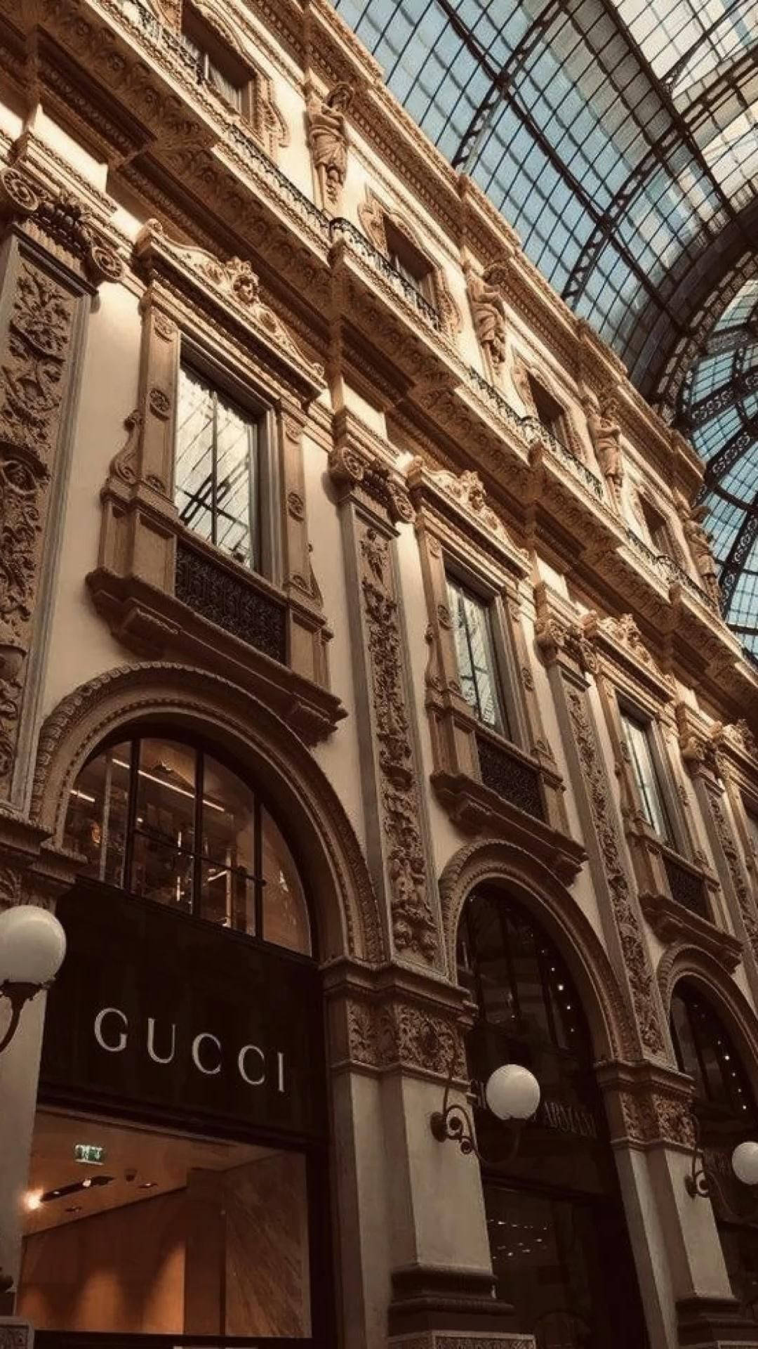 Diseño intrincado de edificio en tonos marrón claro Fondos de pantalla