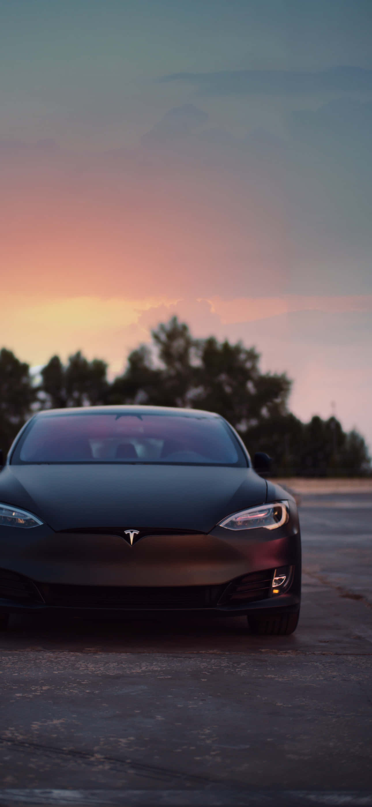 Disfruta de un mundo inalámbrico con el Tesla iPhone. Fondos de pantalla