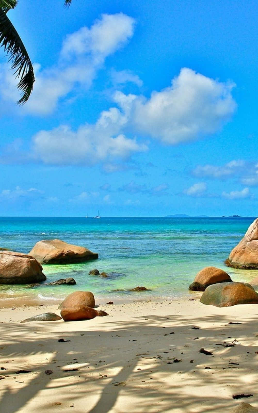 Disfruta del cálido sol del paraíso con Beach Phone. Fondos de pantalla