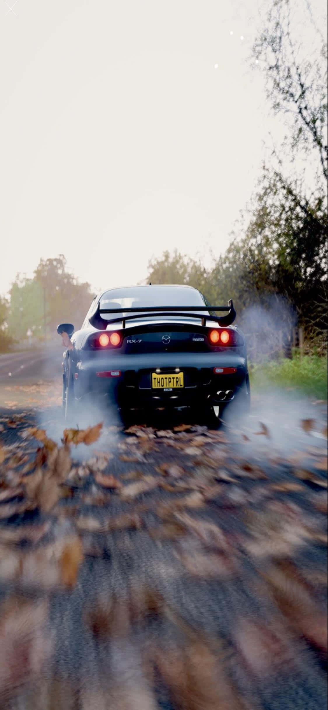 Disfruta gráficos de alta calidad y una experiencia inmersiva con iPhone XS y Forza Horizon 4 Fondos de pantalla