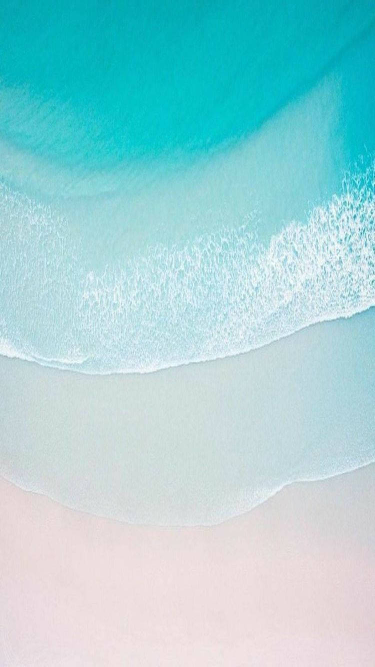 Disfruta la Serenidad de una Playa de Arena con el Nuevo iPhone 11 Fondos de pantalla
