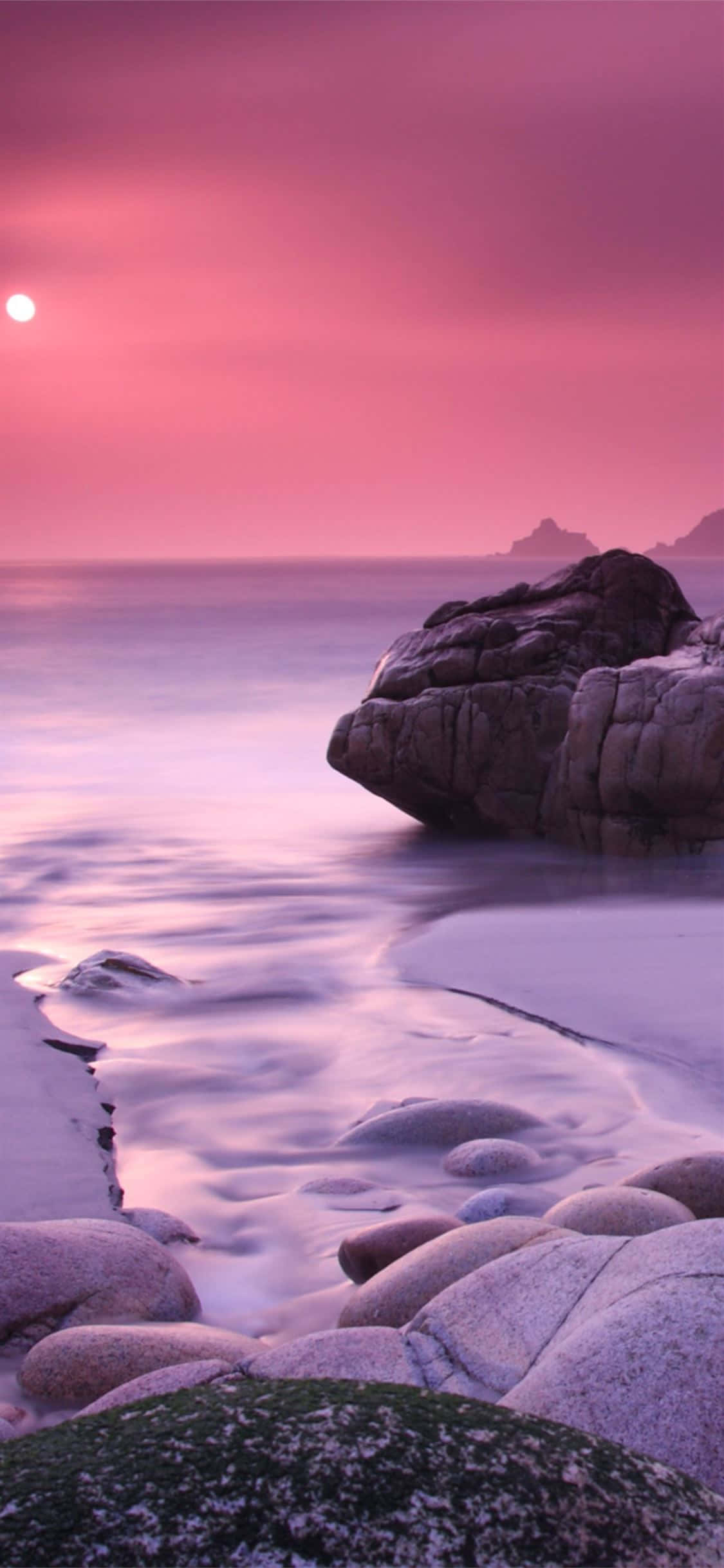Disfruta los azules y rosas brillantes de una tarde tranquila Fondos de pantalla