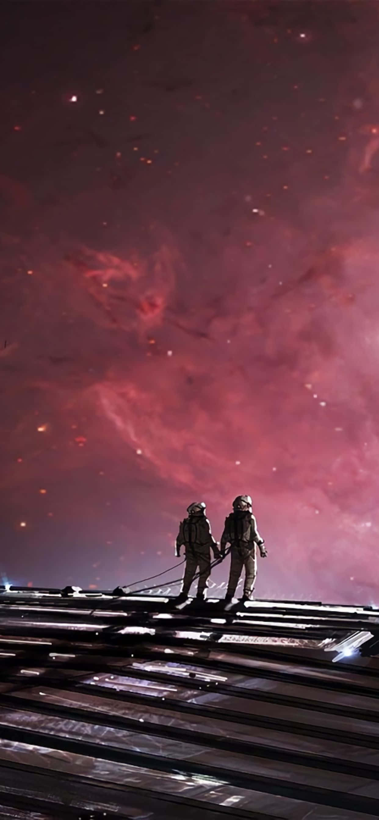 dos astronautas caminando sobre una vía de tren con un cielo rosa Fondos de pantalla