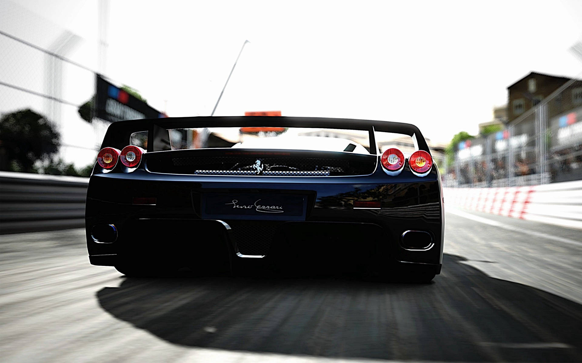 Fondo de pantalla del Ferrari F40 azul acelerando, vista trasera.