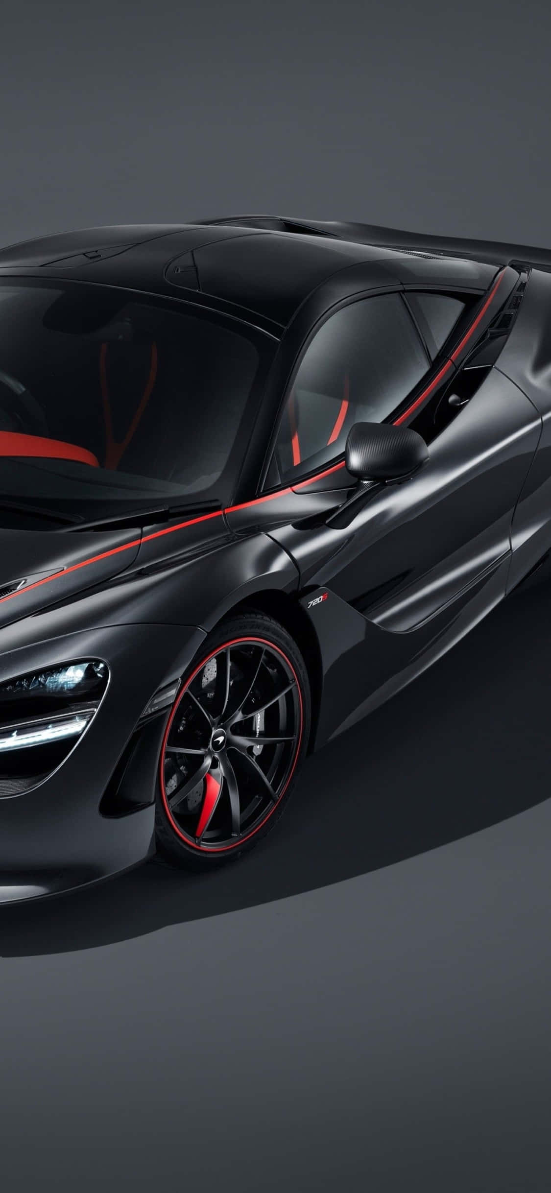 El iPhone Xs junto al elegante McLaren 720s Fondos de pantalla