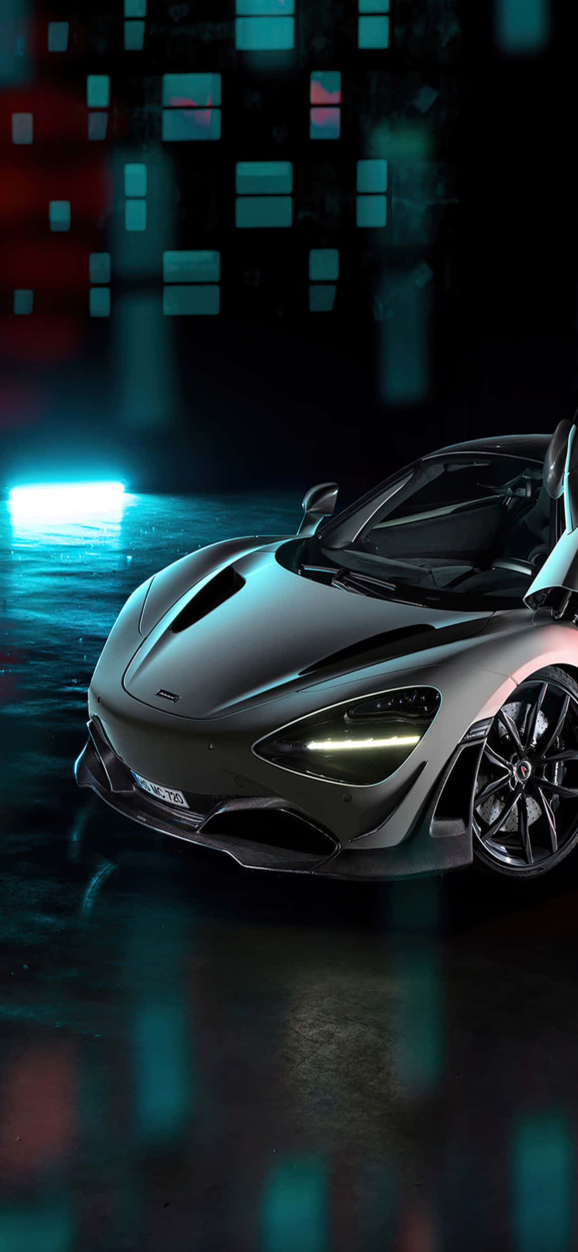 Elegante iPhone X con fondo de auto McLaren 720s Fondos de pantalla