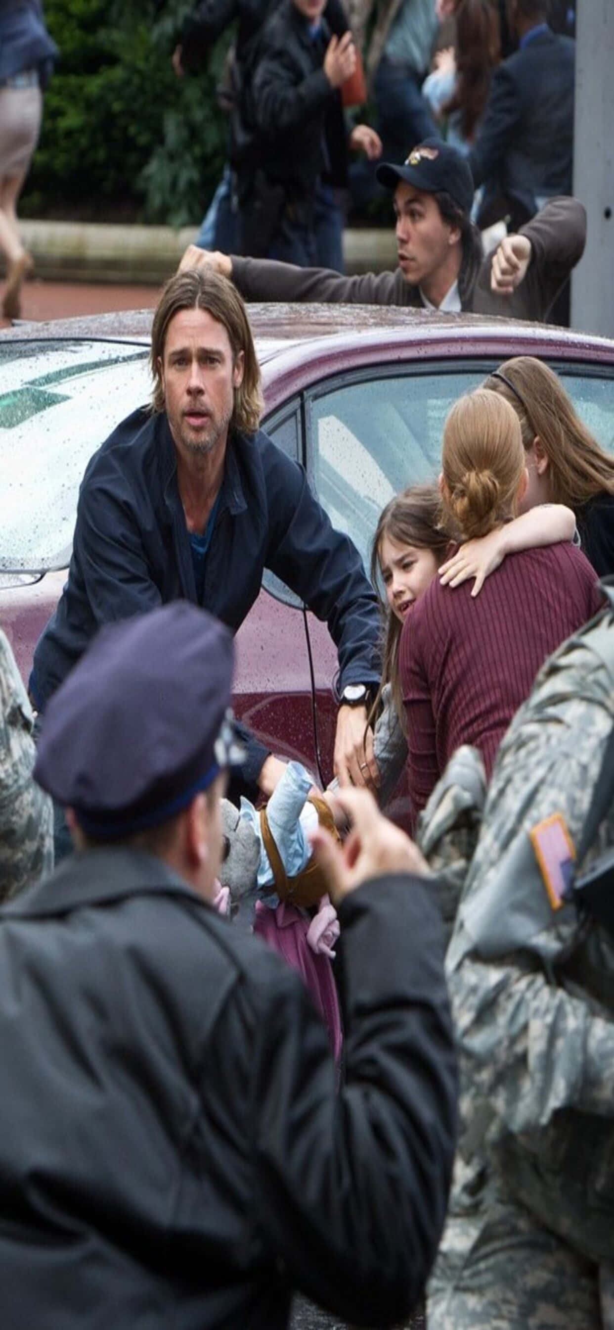 Escena Llena de Acción de World War Z en Pantalla de iPhone XS Max Fondos de pantalla