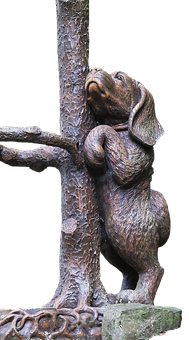 Escultura de perro de bronce mirando hacia arriba Fondos de pantalla