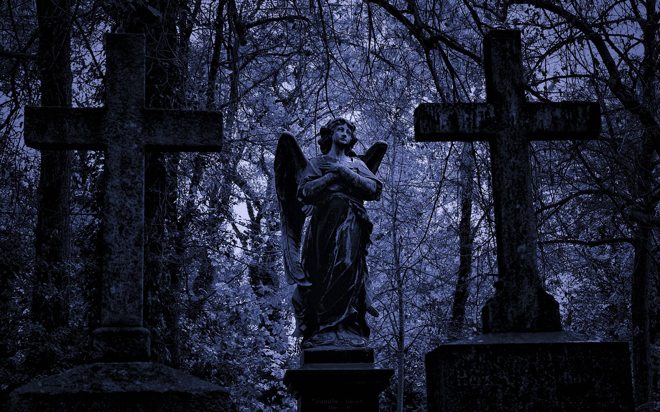 Estatua de Ángel en un Cementerio Fondos de pantalla