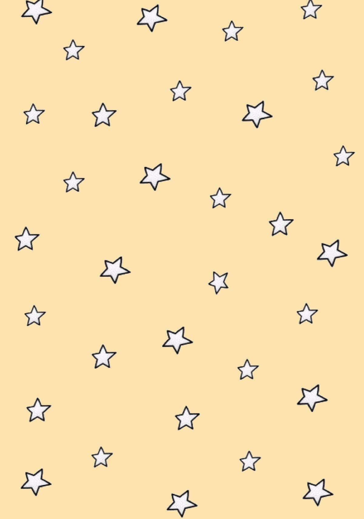 Estrellitas lindas en amarillo pastel estético Fondos de pantalla