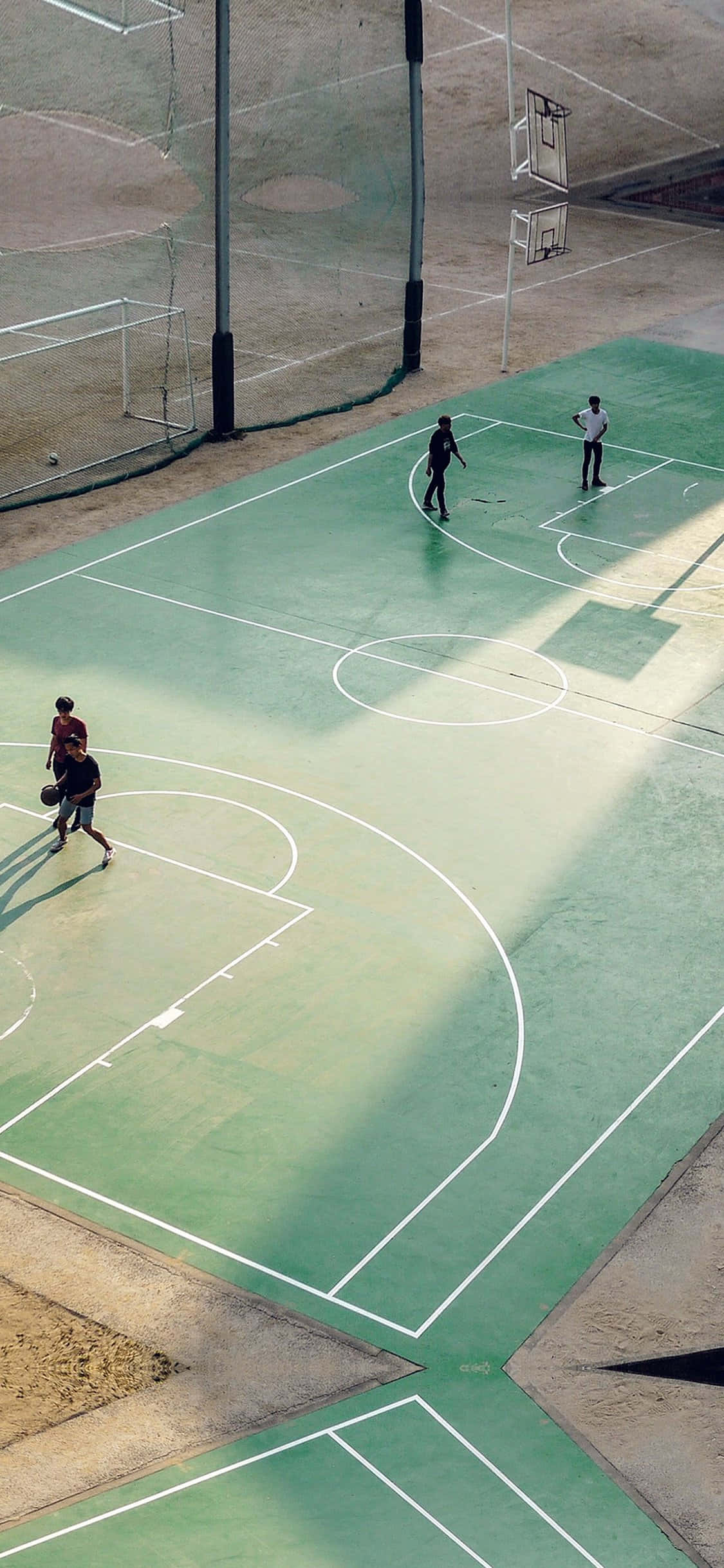 Fondo de cancha de baloncesto verde para iPhone XS Fondos de pantalla