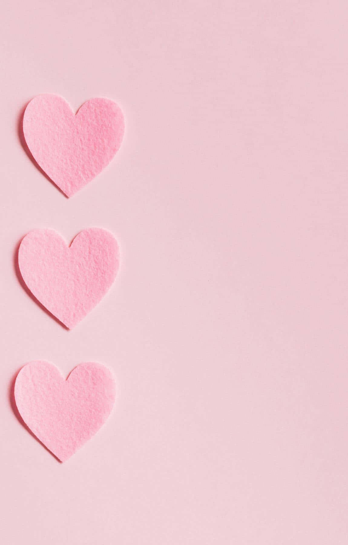 Fondo de corazones rosas en papel texturizado Fondos de pantalla