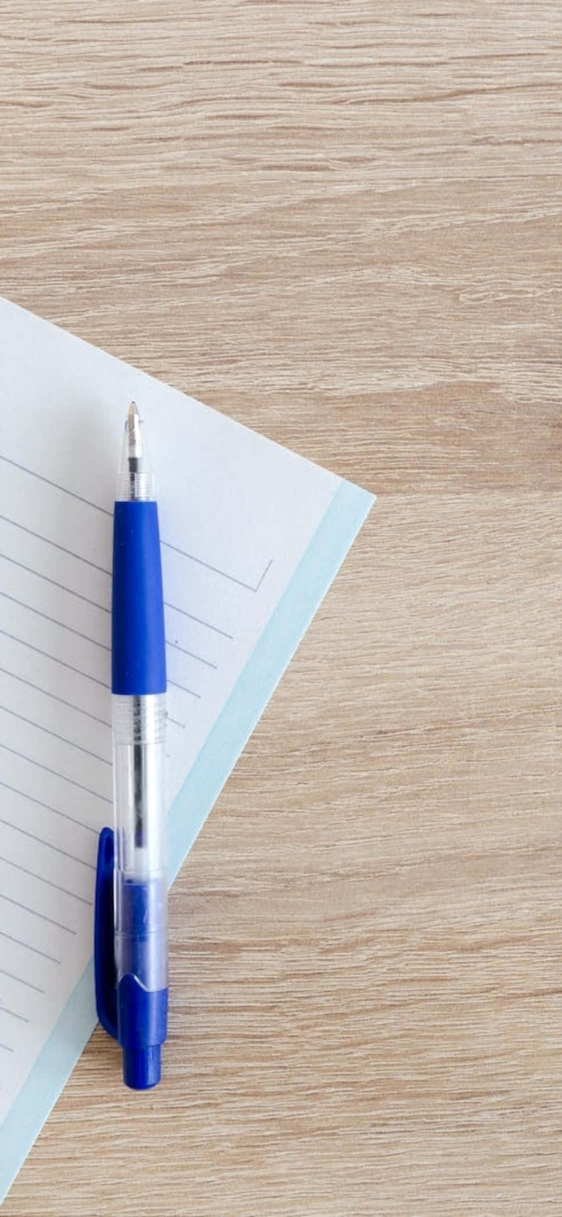Fondo de Escritorio para iPhone X con Bolígrafo Azul y Cuaderno Fondos de pantalla