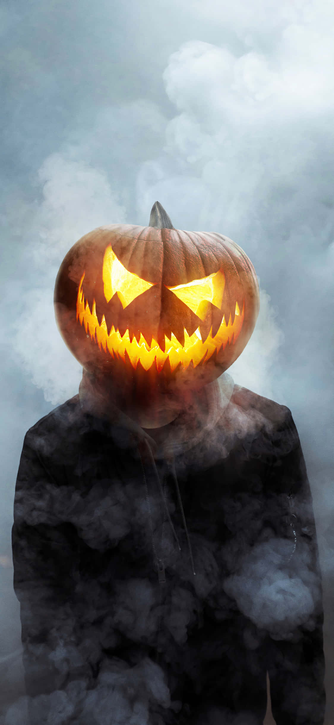 Fondo de Halloween para iPhone con Calabaza Riente Fondos de pantalla