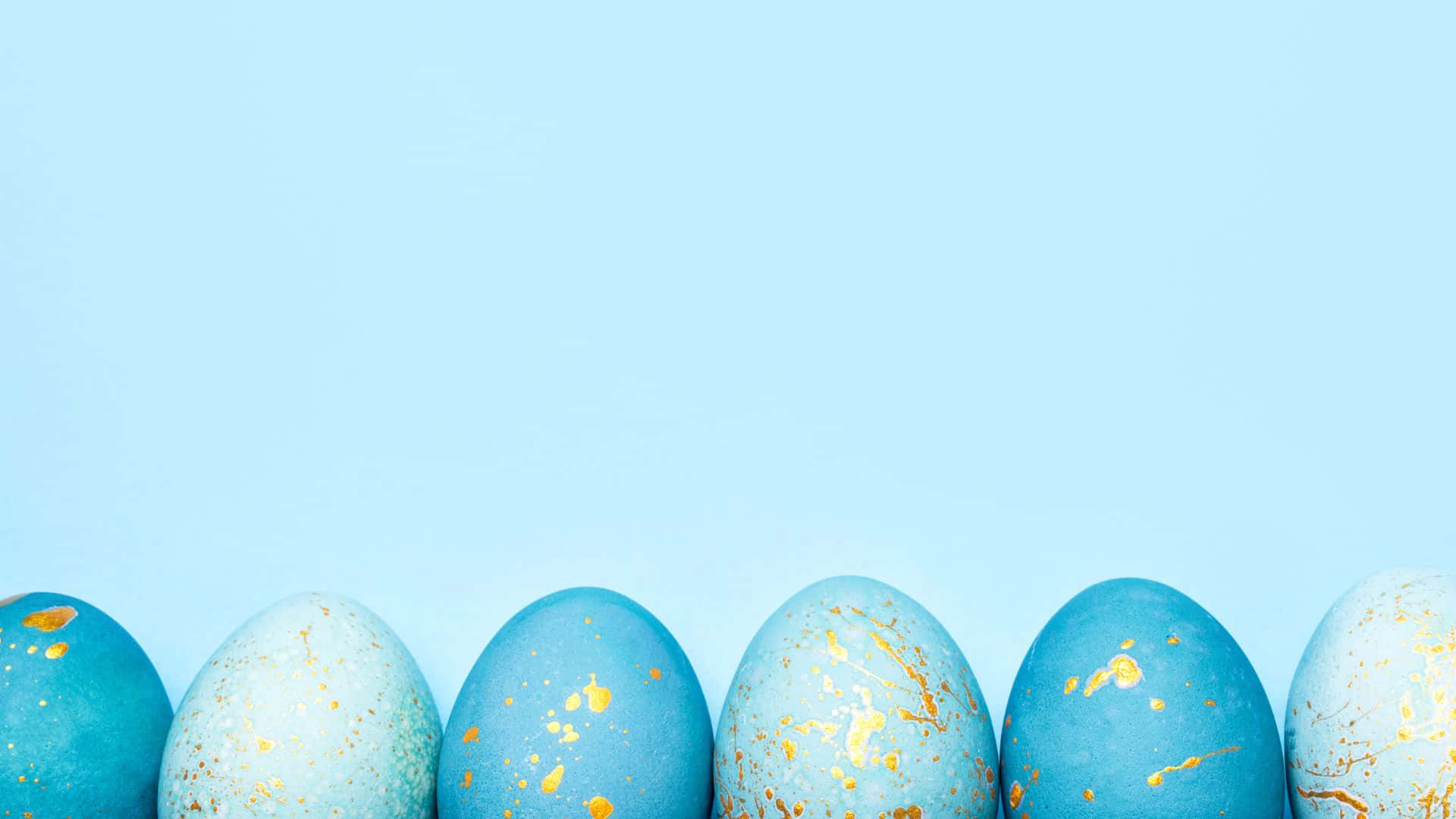 Fondo de huevos de Pascua azul pastel con dorado metálico Fondos de pantalla