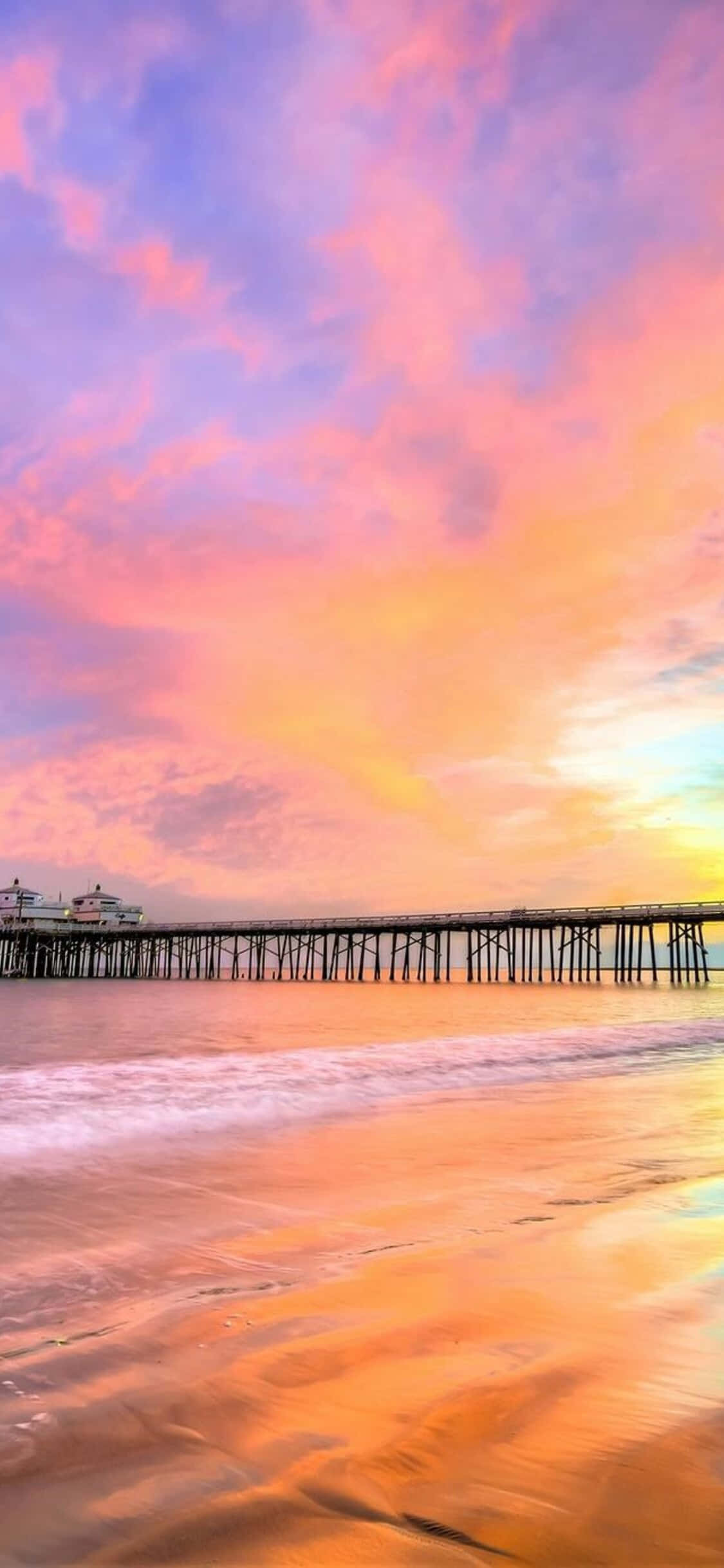 Fondo de Malibú para iPhone X con muelle y playa Fondos de pantalla