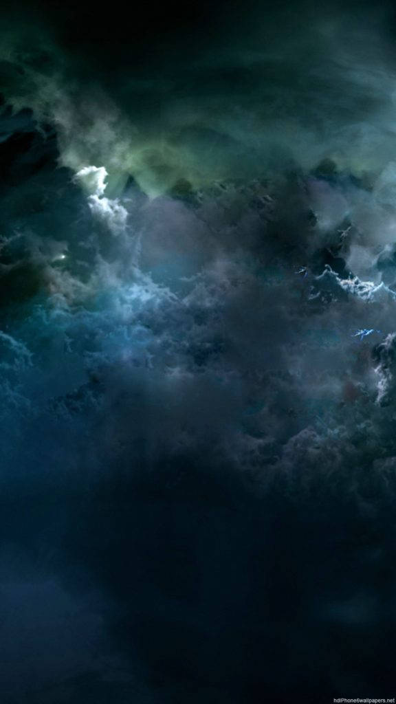 Fondo de pantalla de iPhone con nubes espaciales verde oscuro Fondos de pantalla