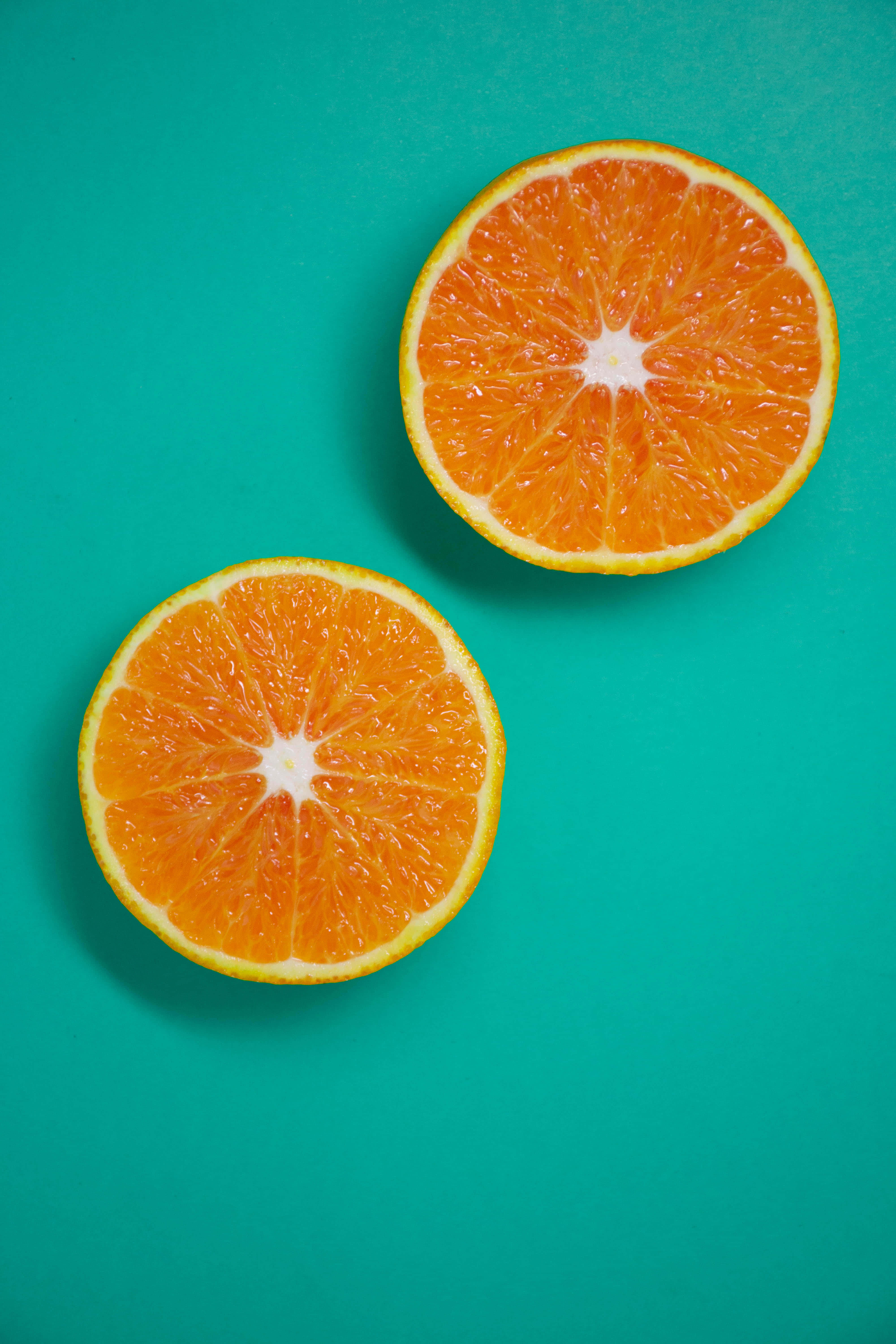 Fondo de Pantalla iPhone de Dos Rodajas de Naranja Fondos de pantalla