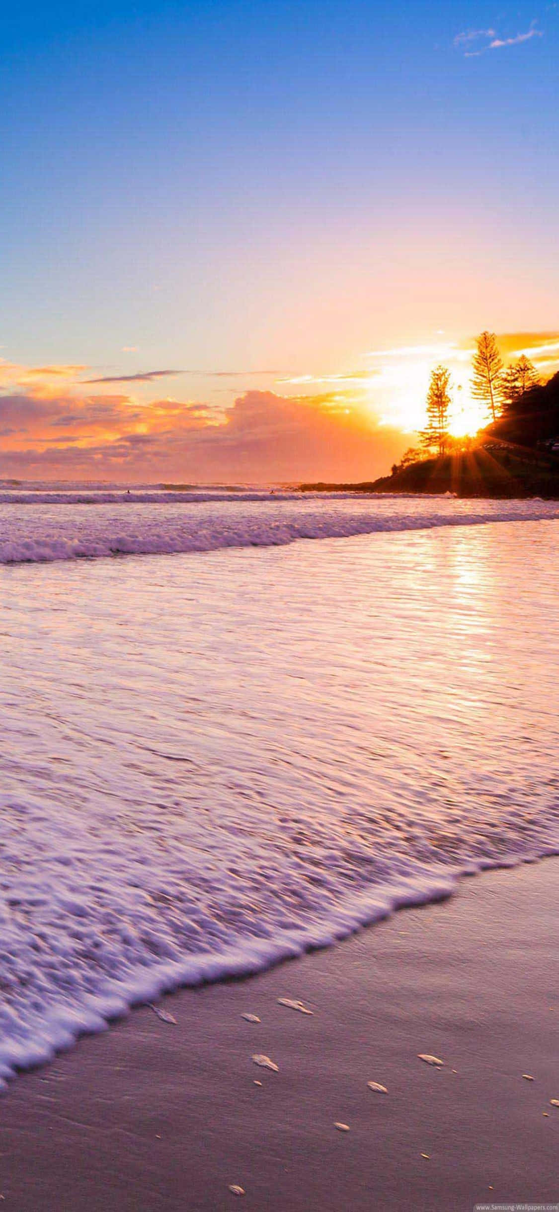 Fondo de playa con larga costa para iPhone XS Fondos de pantalla
