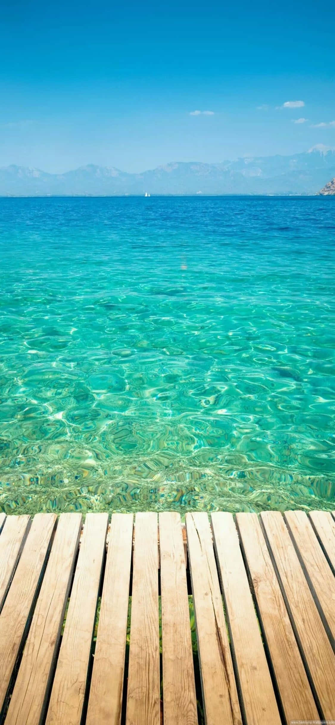 Fondo de playa con plataforma de madera para iPhone XS Fondos de pantalla