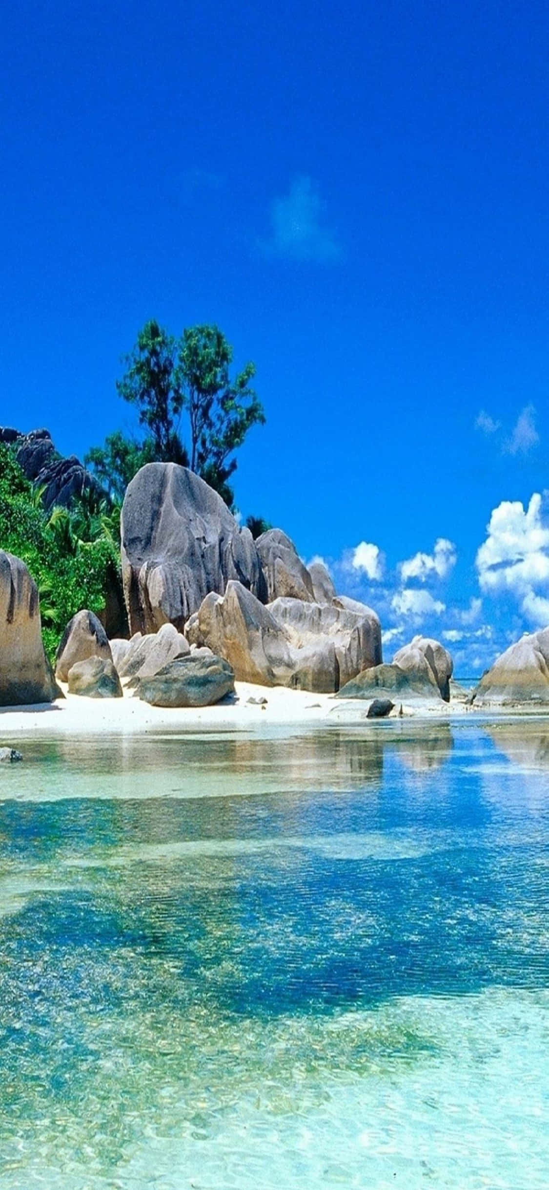 Fondo de playa La Digue para iPhone XS Fondos de pantalla