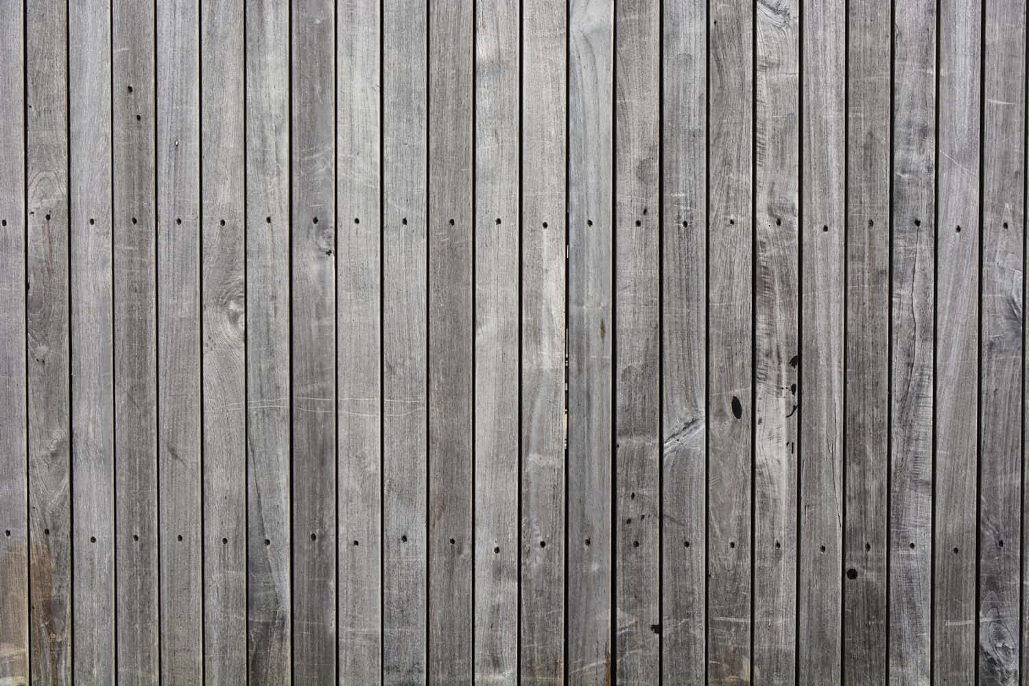 Fondo de tablones de madera gris con marcas de clavos Fondos de pantalla