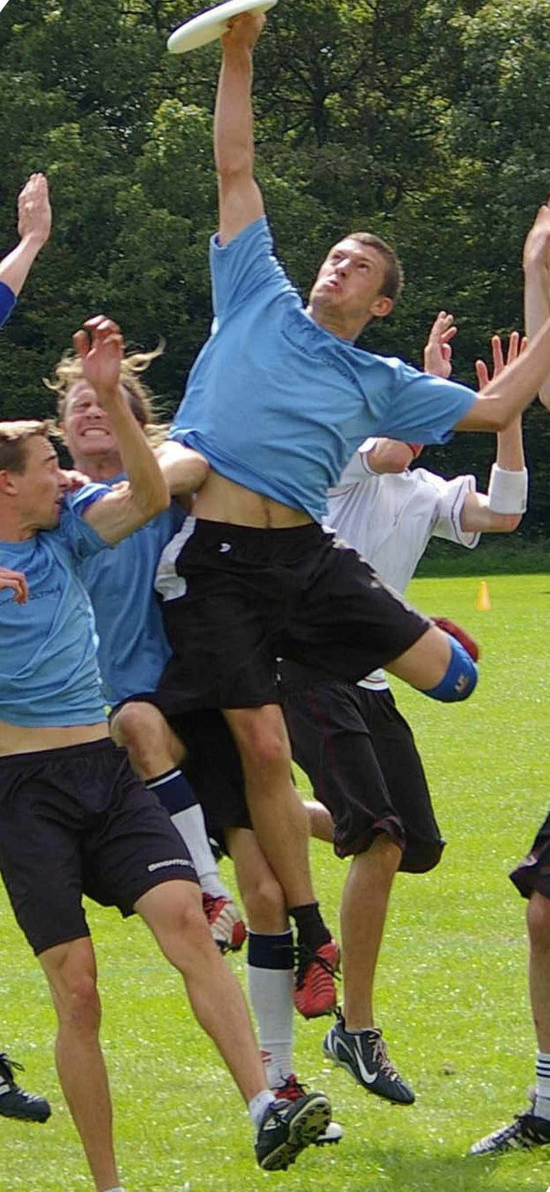 Fondo de ultimate frisbee para iPhone X en acción Fondos de pantalla