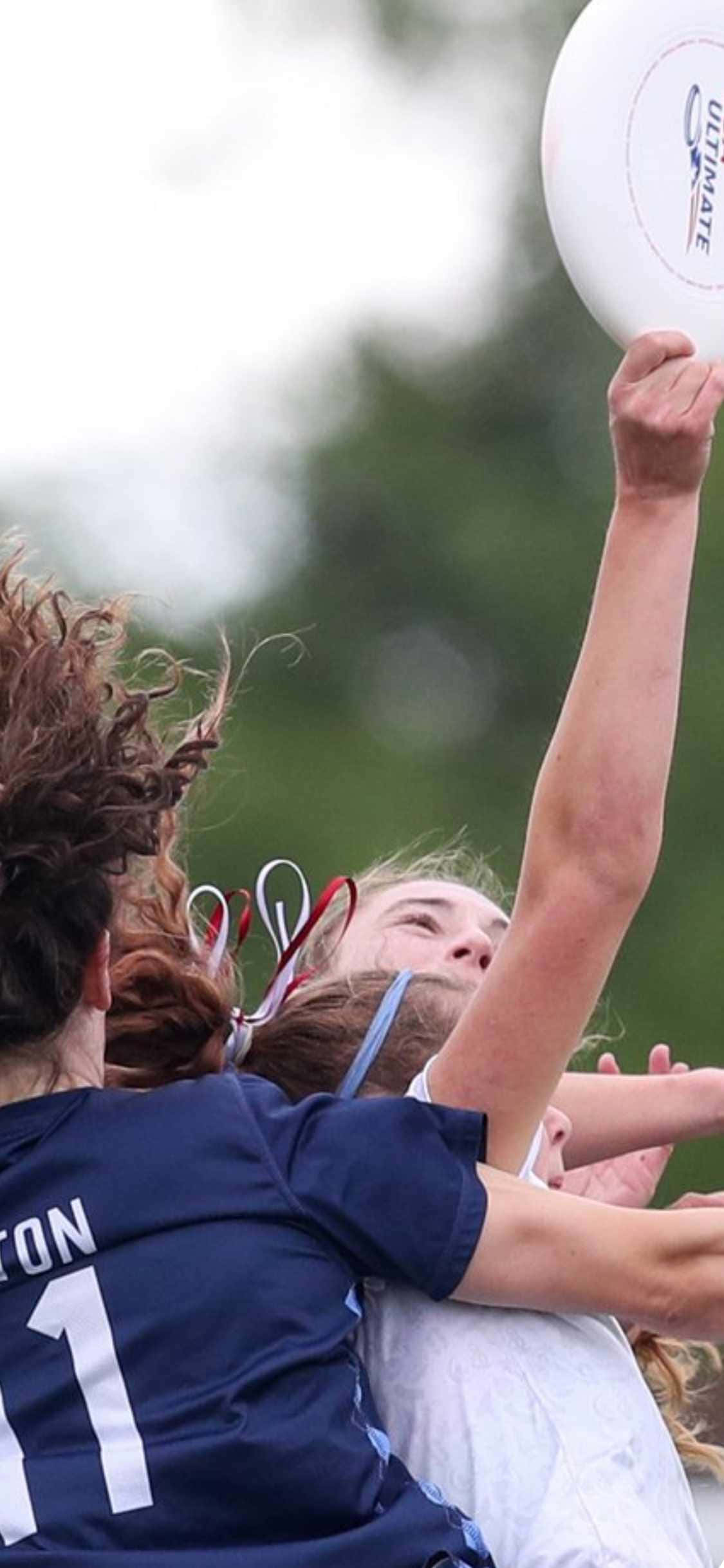 Fondo de Ultimate Frisbee para iPhone X en Plena Acción Fondos de pantalla