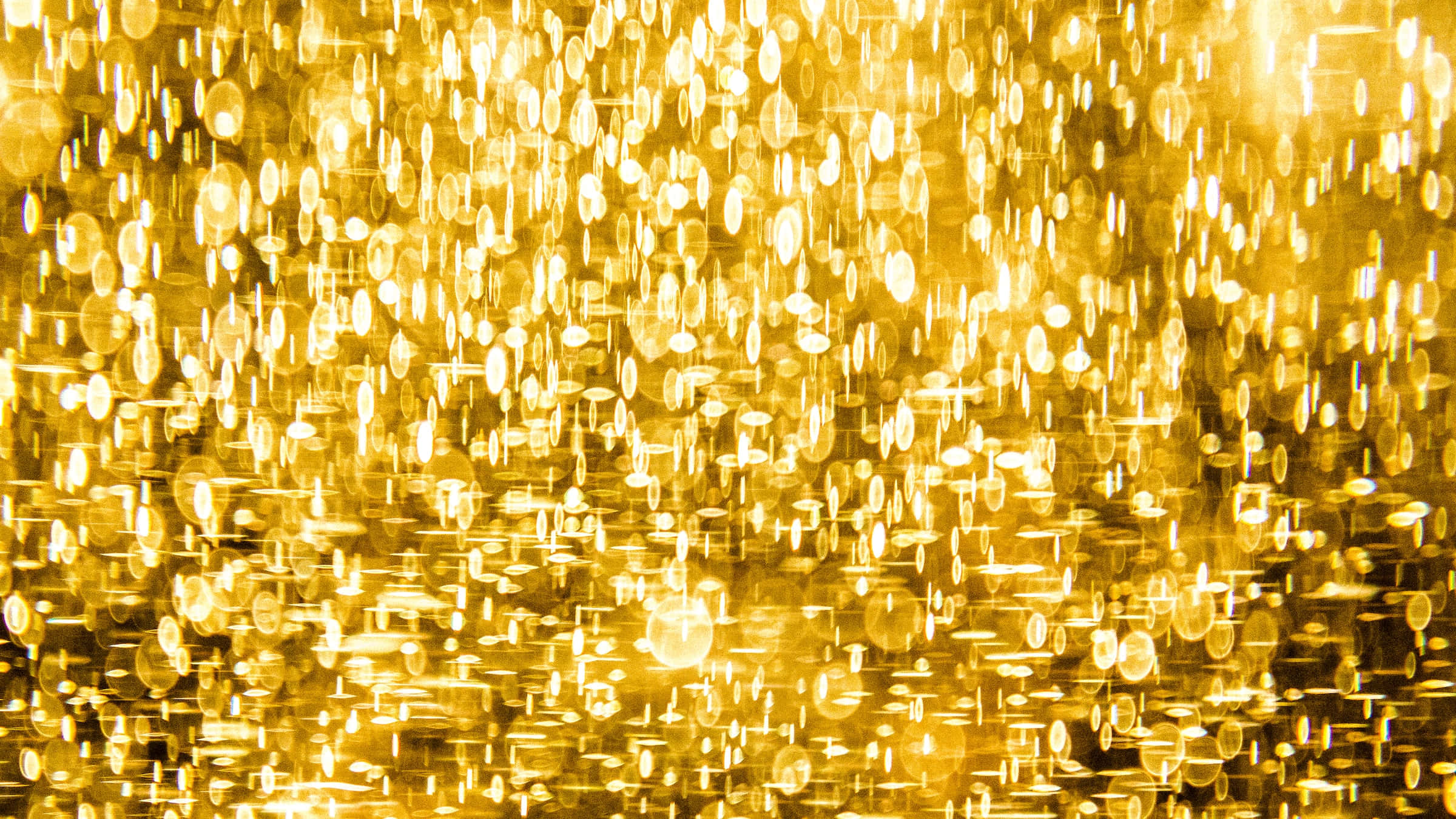 Fondo Dorado Brillante con Luces Borrosas Fondos de pantalla