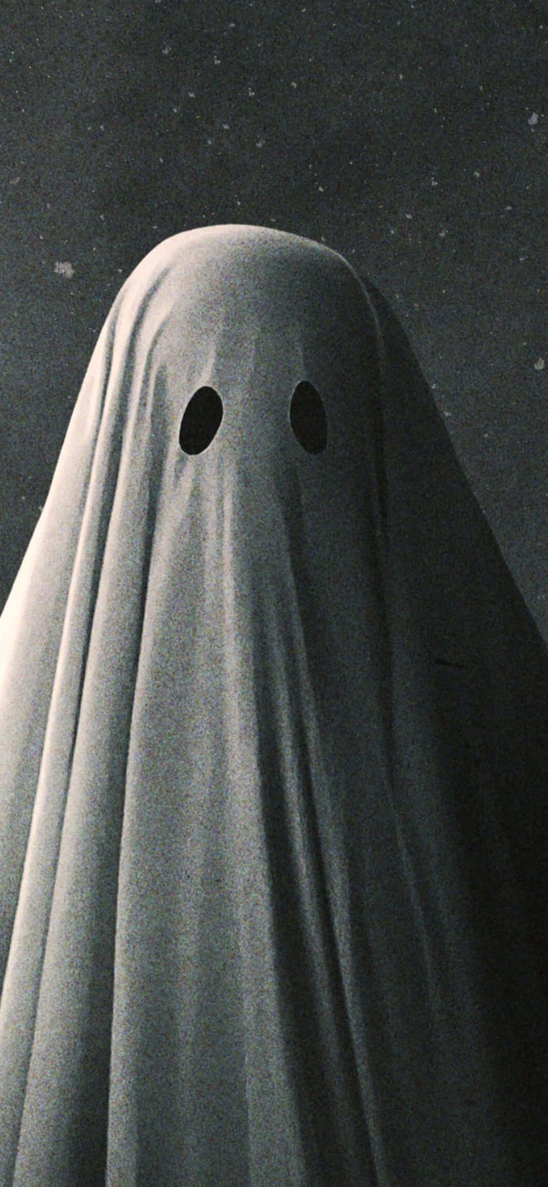 Fondo de Halloween para iPhone con fantasma de manta Fondos de pantalla