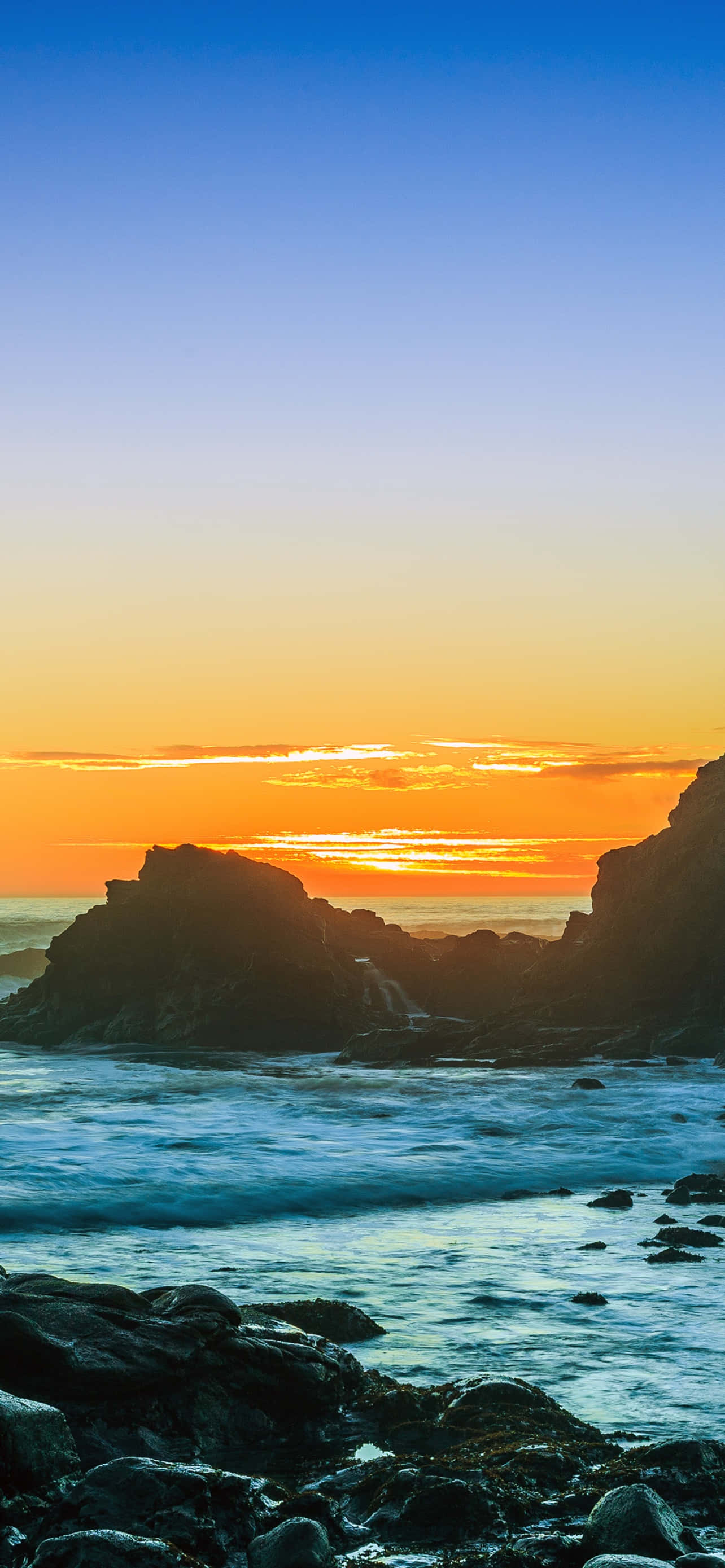 fondo iPhone X Malibu cielo azul y naranja Fondos de pantalla